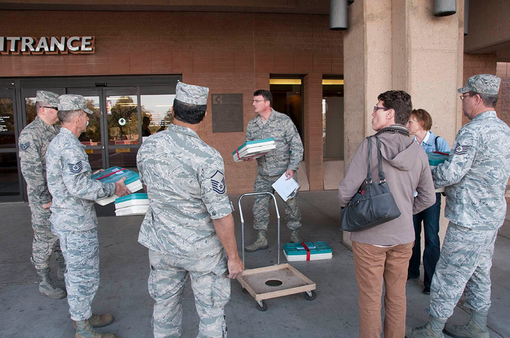Airmen in the community, 162nd Fighter Wing members deliver meals to homebound individuals. (U.S. Air National Guard photo by Master Sgt. David Neve/Released)