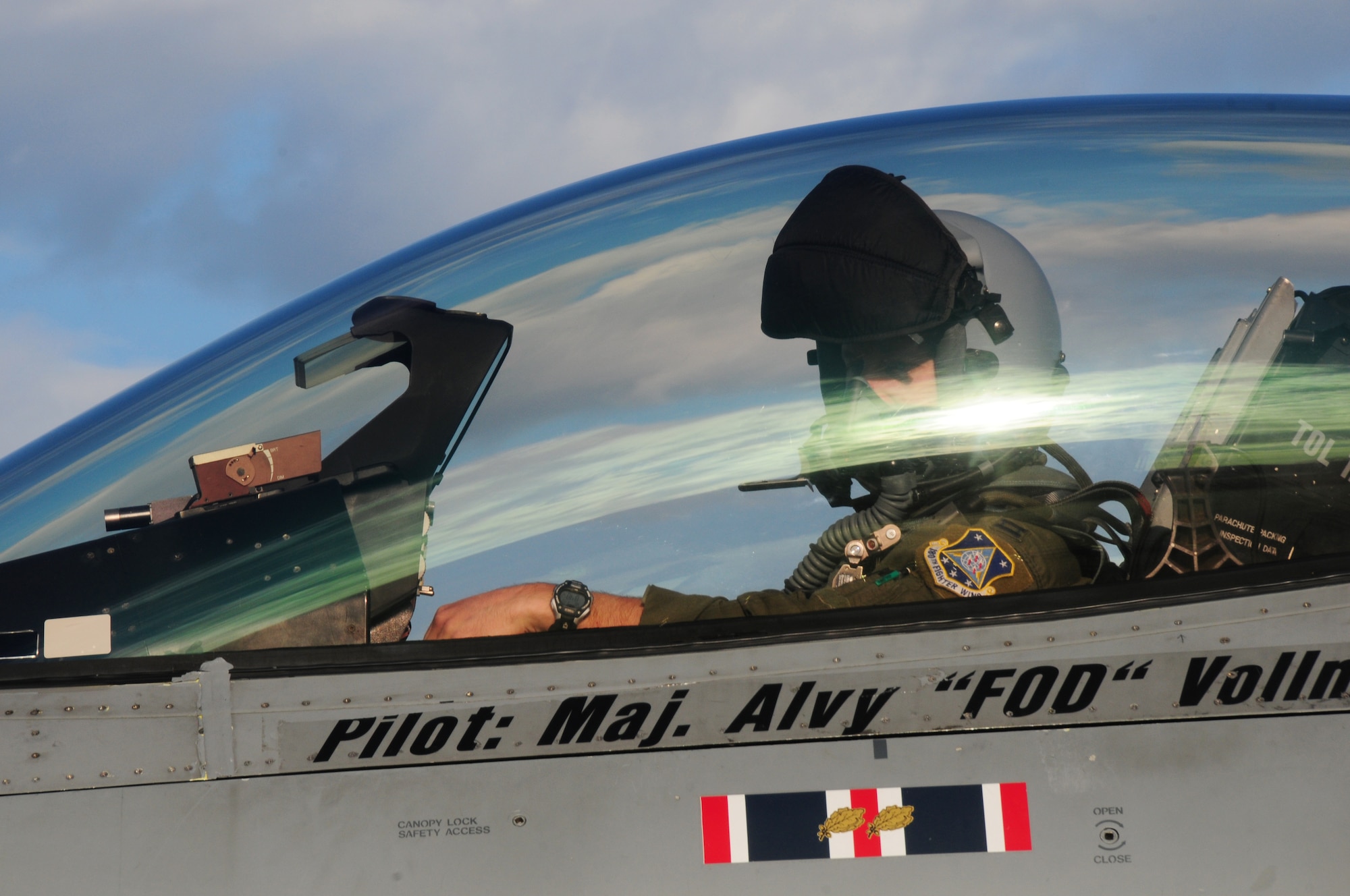 180th Fighter Wing F-16 Fighting Falcon pilot Capt. Jerad Ames prepares for a training flight at Joint Reserve Base New Orleans, New Orleans, La.  Jan. 16, 2014.  The 180th FW is currently participating in a training exercise with F-15 Screaming Eagles from the 159th FW, New Orleans Air National Guard.  The purpose of this training is to aid pilots in maintaining familiarity with capabilities of different fighter aircraft.  The 180th’s F-16s are a multi-role aircraft whereas the F-15s conduct mainly air-to-air missions. (Ohio Air National Guard photo by Staff Sgt. Amber Williams/Released)