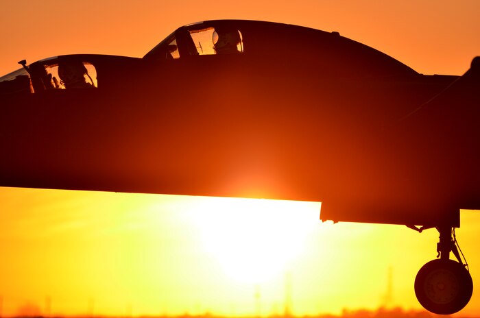 U-2 pilots prepare to land a TU-2S Dragon Lady at sunset on Beale Air Force Base, Calif., Jan. 22, 2014. TU-2S are trainer aircraft used to gain proficiency before pilots deploy for operational missions. (U.S. Air Force photo by Airman 1st Class Bobby Cummings/Released)