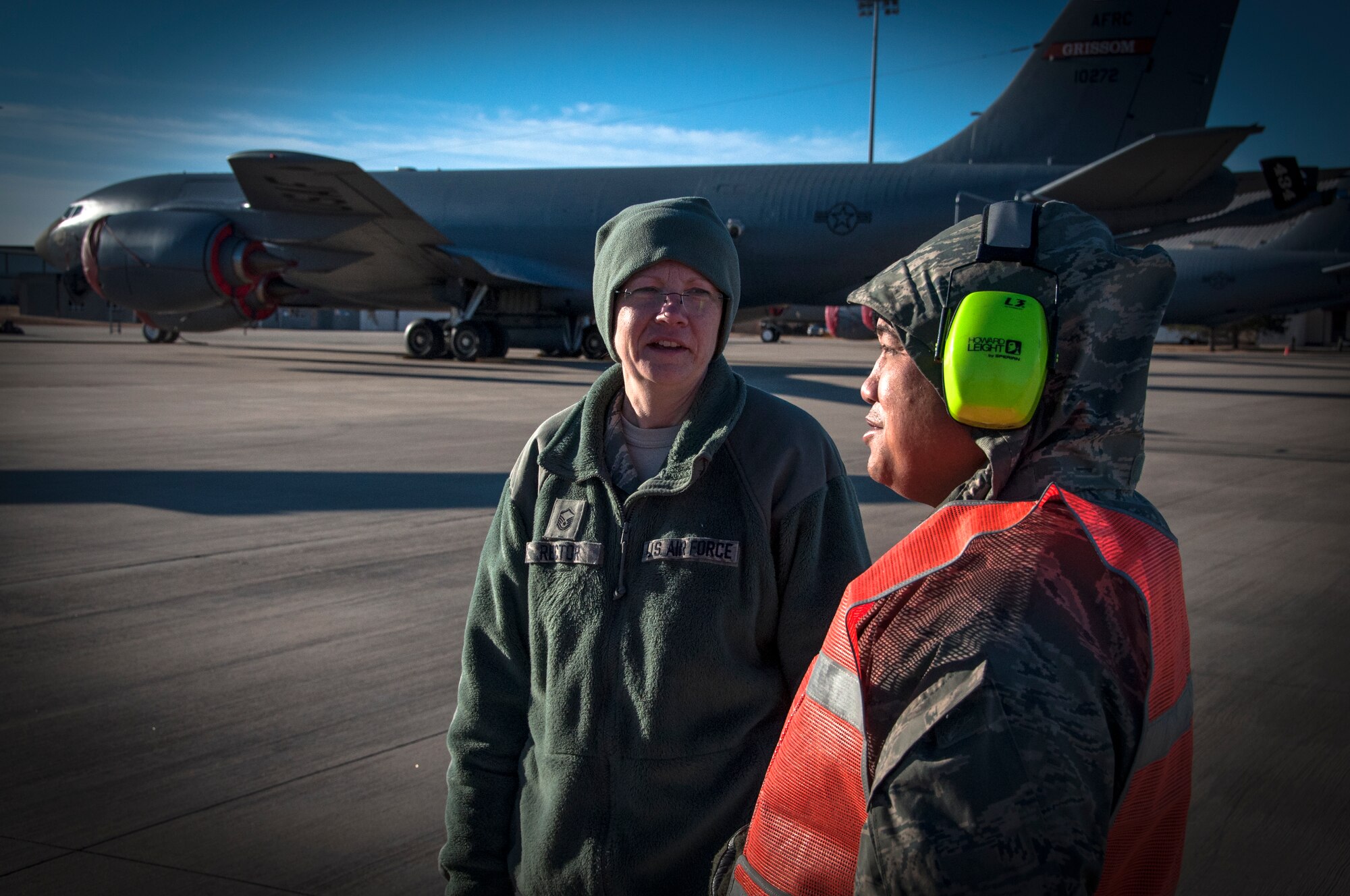 With wind chills dipping well below 32 degrees, Master Sgt. Regina Rector, left discusses cold weather safety on the flight line with Tech. Sgt. Rodolfo Ando, 507th Maintenance Squadron during a pre-flight inspection recently.  Rector is the Air Force Reserve Command’s 2013 Outstanding Safety Civilian of the Year Award winner.  (U.S. Air Force photo/Senior Airman Mark Hybers)  