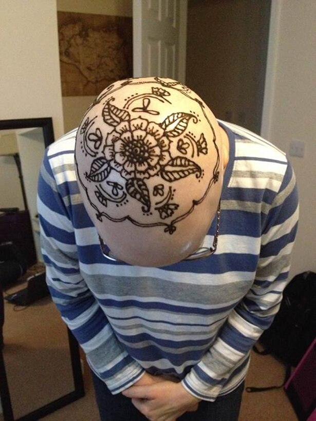 RAF ALCONBURY, United Kingdom – Bonnie Ogden shows off her henna tattoo that Sara Butler, spouse of Master Sgt. Mathew Butler, 423rd Security Forces Squadron, gave her in preparation for the 501st Combat Support Wing’s Air Force Ball. (Photo courtesy Chief Master Sgt. Michael Ogden)