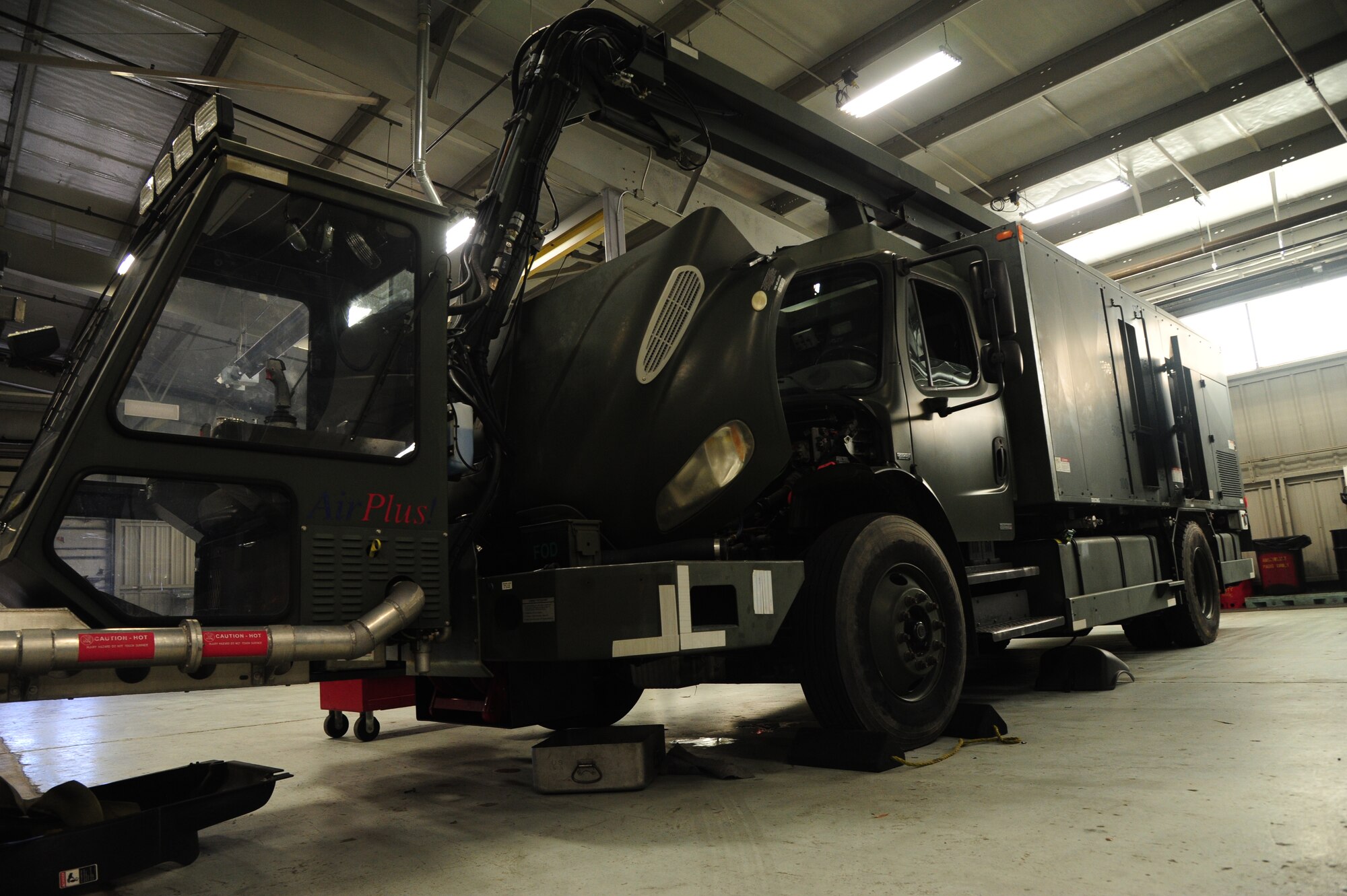 Ice and freezing temperatures can slow down the mission when it comes to aircraft. The wear and tear from the high demand of the winter season keeps the 19th Logistics Readiness Squadron vehicle management shop busy with repairs on the de-icers. (U.S. Air Force photo by Senior Airman Kaylee Clark)