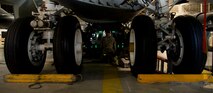 Airman 1st Class John Thompson, 5th Aircraft Maintenance Squadron weapons load crew member, prepares to load an AGM 86B air-launched cruise trainer missile in a B-52H Stratofortress at Minot Air Force Base, N.D., Jan. 14, 2013. As part of Air Force Global Strike Command, load crews work endlessly to preserve our nation’s security by providing combat-ready forces for nuclear deterrence and global strike operations. (U.S. Air Force photo/Senior Airman Brittany Y. Auld)