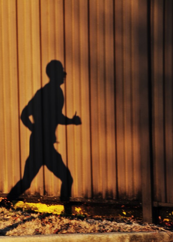 A service member runs the Rev. Dr. Martin Luther King Jr. 5K fun run/walk here, Jan. 17, 2014. Joint Base Andrews held a 5K to commemorate the contributions King made to the equal treatment of all Americans. (U.S. Air Force photo/Airman 1st Class Aaron Stout)