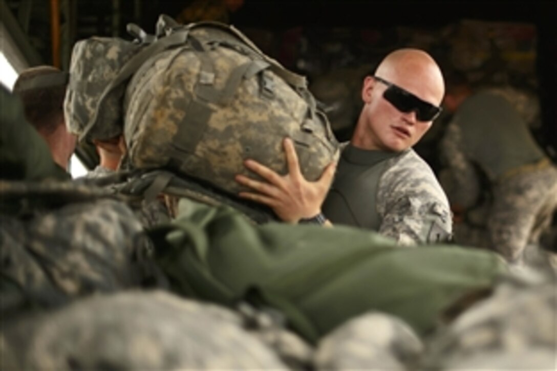U.S. soldiers unload gear and supplies from a U.S. Air Force C-130J Hercules in Juba, South Sudan, Jan. 22, 2014. The East Africa Response Force has been positioned at the U.S. Embassy in Juba, South Sudan, since Dec. 18, 2013, when the initial evacuation of U.S. citizens took place. The force is part of a Defense Department initiative to provide the commander of the U.S. Africa Command an additional capability to respond to crises and contingencies.