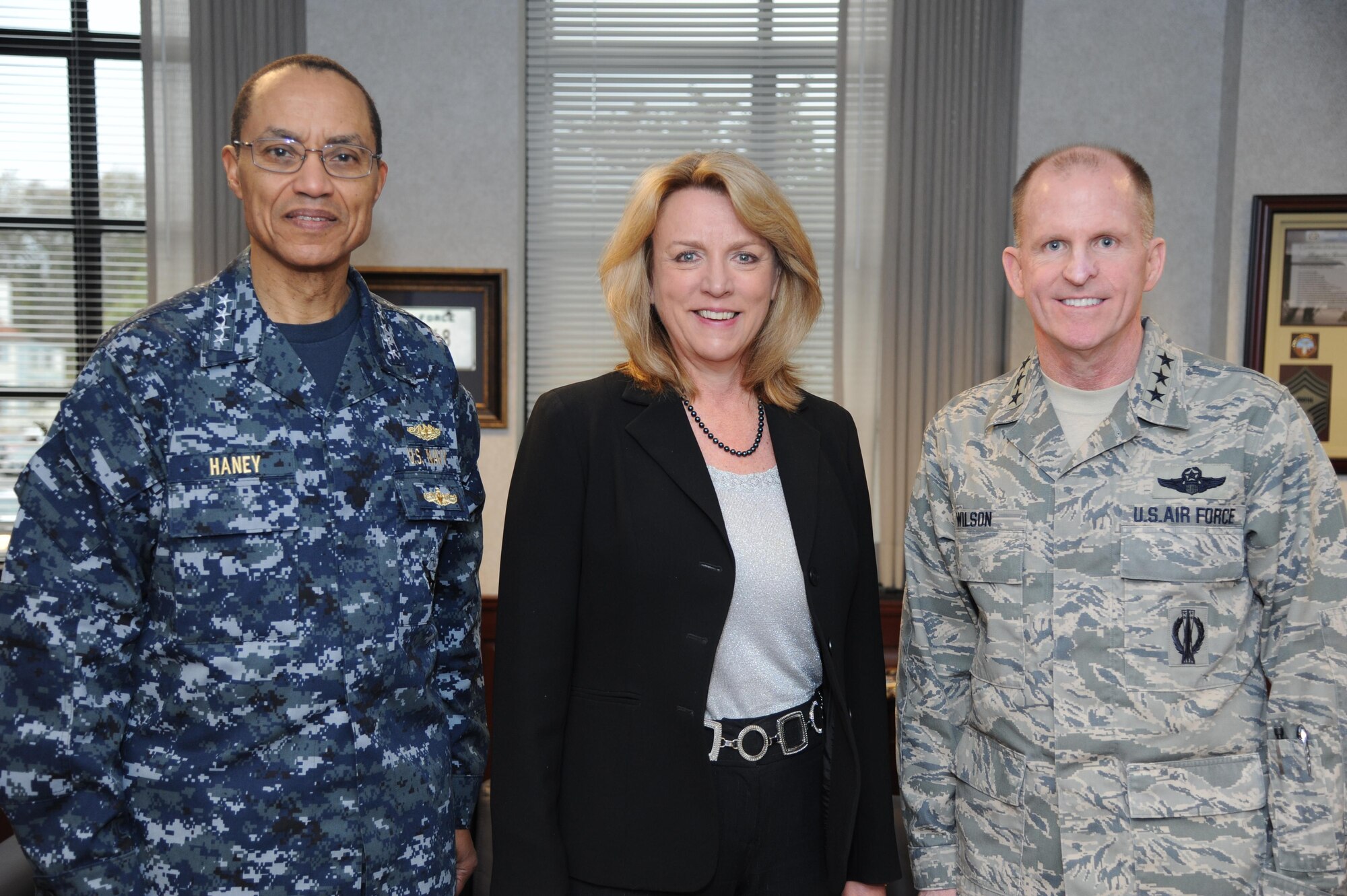 Secretary of the Air Force Deborah Lee James, U.S. Strategic Command Commander Adm. Cecil Haney, and Air Force Global Strike Command Commander Lt. Gen. Stephen Wilson pose for a photo prior to an office call.  James met with Haney and Wilson to discuss her observations following her visits to four of the five AFGSC bases, Jan. 20-23, culminating at Barksdale AFB, La. (U.S. Air Force photo/Senior Master Sgt. Corey A. Clements)