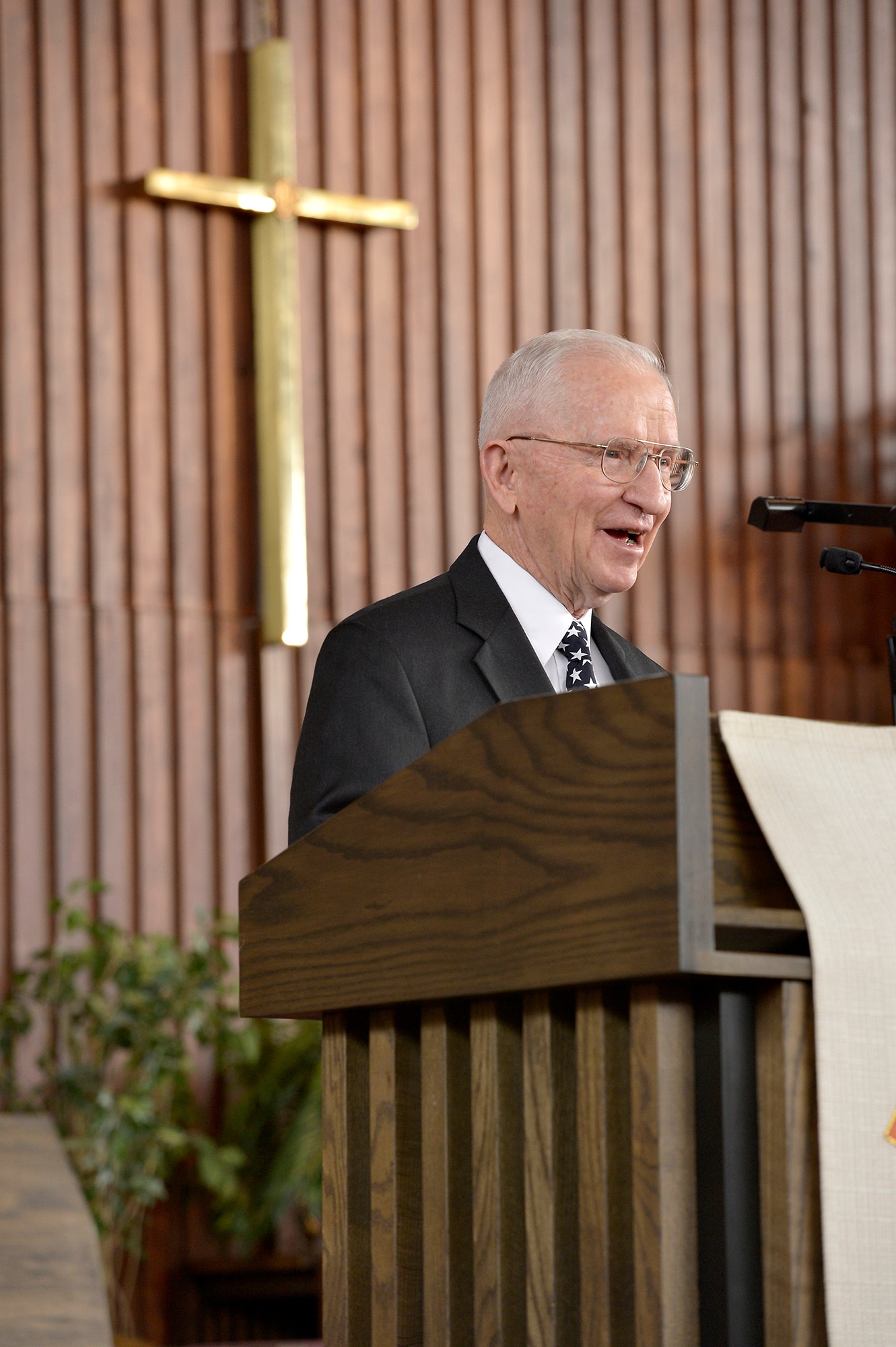 Ross Perot speaks at the internment ceremony for Brig. Gen. Robinson "Robbie" Risner Jan. 23, 2014, at the Memorial chapel on Fort Myer, Arlington, Va., before being laid to rest at Arlington National Cemetery. Risner was one of the most celebrated pilots in Air Force history and survived seven and a half years of captivity in Hoa Lo Prison, also known as the Hanoi Hilton. (U.S. Air Force photo/Michael J. Pausic)