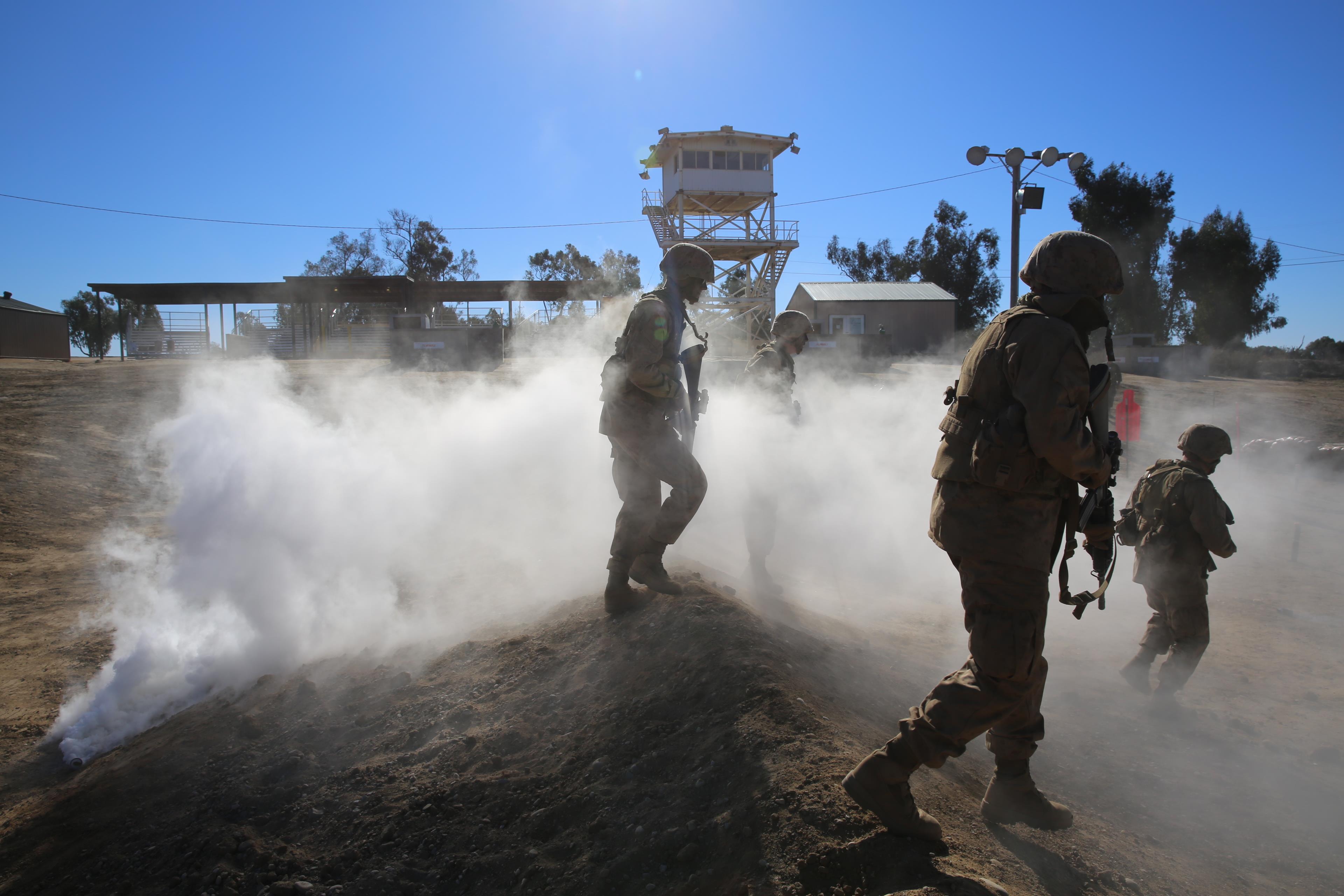 Company C Marines, 1st Recruit Training Battalion, run over a berm during Copeland’s Assault at Edson Range, Jan. 15. The first time the Marines ran through the course it was an individual effort. During the Crucible, the exercise became a team effort.