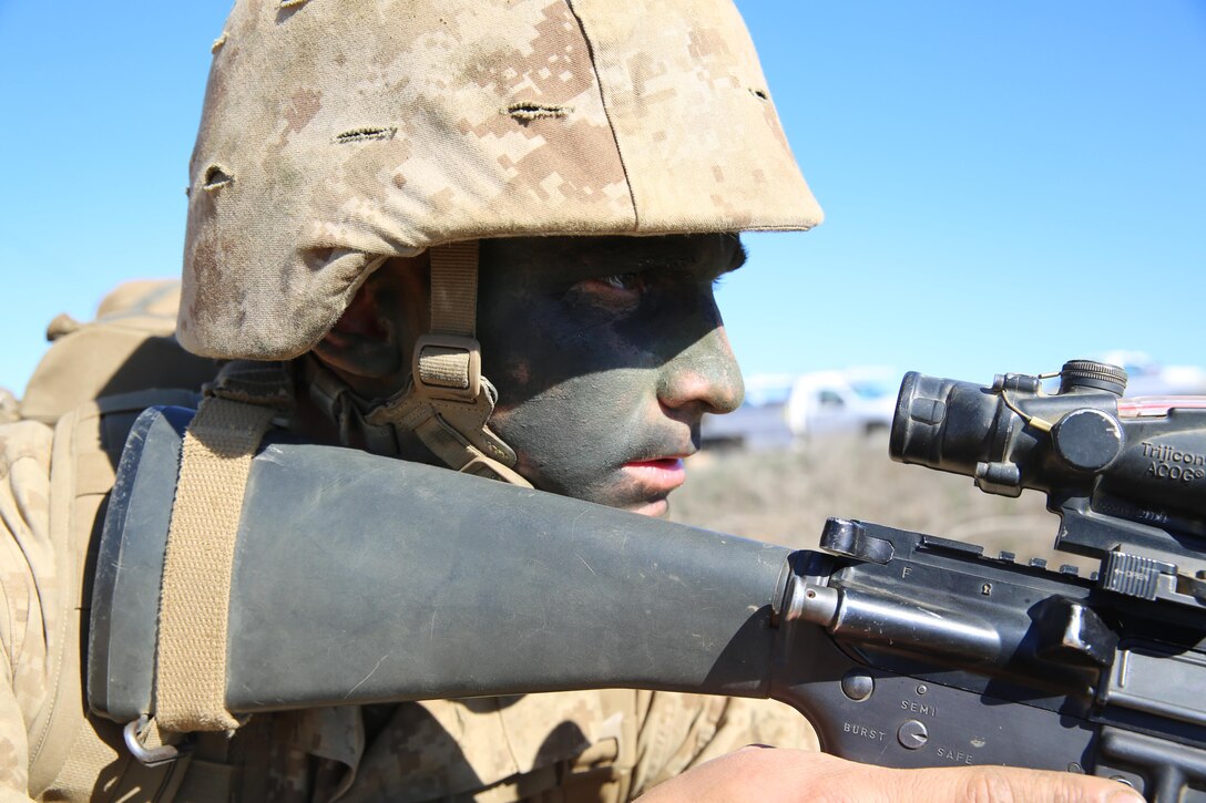 Pfc. Frederick M. Padilla, Jr., Platoon 1046, Company C, 1st Recruit Training Battalion, sets up security during the course known as the Improvised Explosive Device lane at Edson Range, Jan. 15. Padilla’s father is Maj. Gen. Frederick M. Padilla, director of operations, Plans, Policies and Operations, Headquarters Marine Corps.