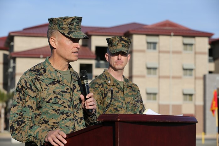 U.S. Marine Brig. Gen. Carl E. Mundy III, left, deputy commanding general, I Marine Expeditionary Force, addresses U.S. Marines and sailors and Japanese soldiers during the opening ceremony of Exercise Iron Fist 2014 aboard Camp Pendleton, Calif., Jan. 23, 2014. Iron Fist is an amphibious exercise that brings together Marines and sailors from the 15th Marine Expeditionary Unit, other I MEF units, and soldiers from the Japan Ground Self-Defense Force, to promote military interoperability and hone individual and small-unit skills through challenging, complex and realistic training. (U.S. Marine Corps photo by Lance Cpl. Ricardo Hurtado/Released)