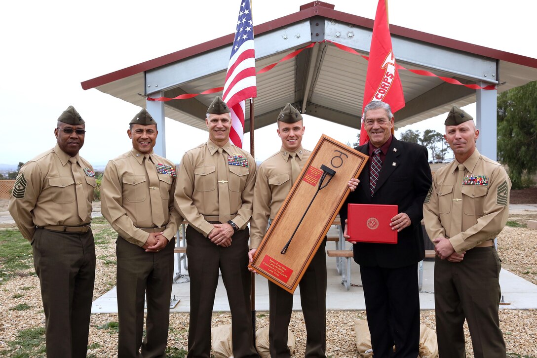 Brig. Gen. John W. Bullard presented the Marine Corps Base Camp Pendleton Cantonment of the Quarter, large camp, award to Col. Michael E. Cordero at the 16-Area pavilion Jan. 24. The plaque has been awarded to Main Side for the 1st quarter of 2014. Bullard is the commanding general of Marine Corps Installations - West, Marine Corps Base Camp Pendleton and Cordero is the commanding officer of Headquarters & Support Battalion, Marine Corps Base Camp Pendleton.