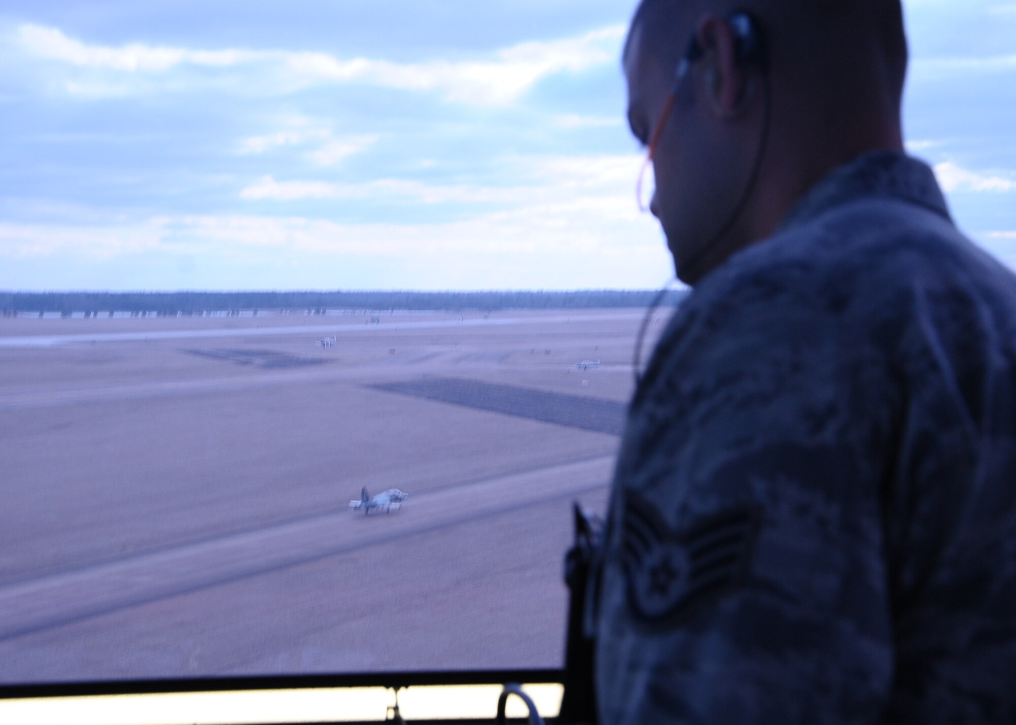 Staff Sgt. Jamerson Watts, 14th Operations Support Squadron, watches a T-38 land from the Air Traffic Control tower. (U.S. Air Force Photo/Airman 1st Class Daniel Lile)