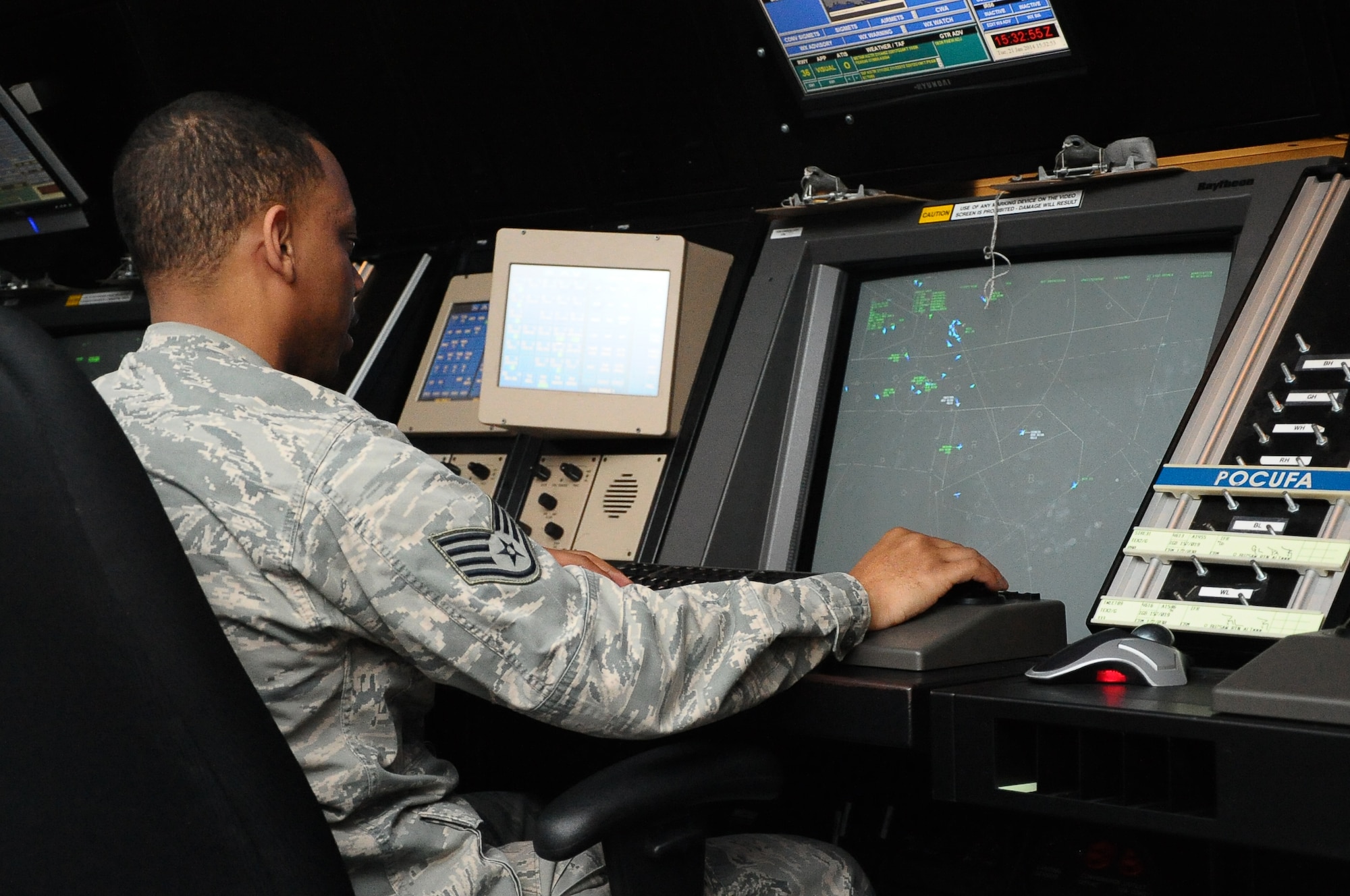 Staff Sgt. Laaron Odum, 14th Operations Support Squadron monitors T-6 aircraft as they conduct training missions in Radar Approach Control airspace.  (U.S. Air Force Photo/Airman 1st Class Daniel Lile)