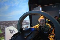Civil Air Patrol Cadet Miranda Leonard concentrates on the aircraft instruments on the T-6 simulator on Joint Base San Antonio-Randolph Dec. 11.  (U.S. Air Force photo by Lt. Col. Andreas K. Wesemann) (Released)


