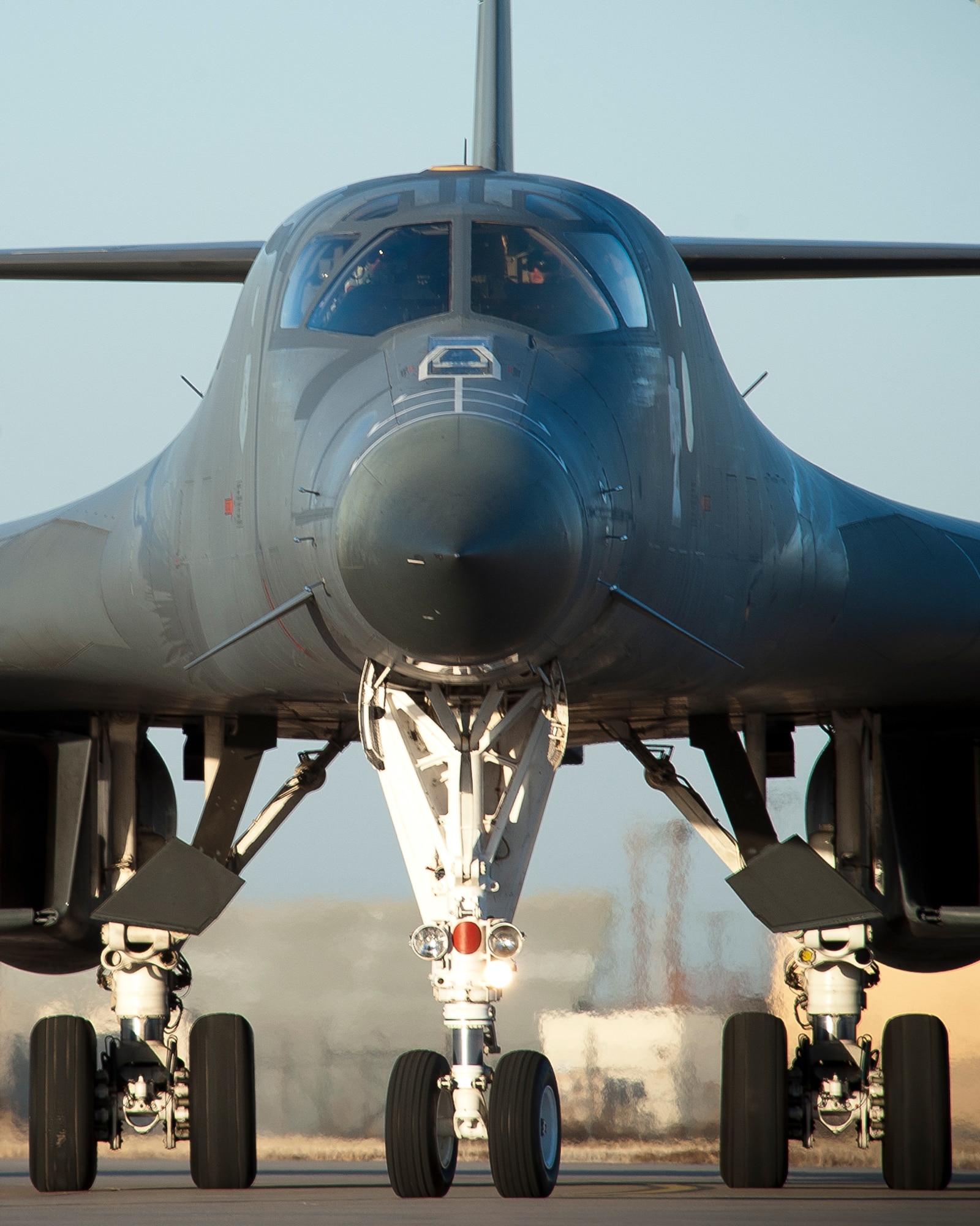 The first newly upgraded operational B1-B Lancer taxis in prior to a crew swap Jan. 21, 2014, at Dyess Air Force Base, Texas. The B-1B Lancer was recently upgraded with a new Integrated Battle Station. The IBS is a combination of three different upgrades, which include a Fully Integrated Data Link, a Vertical Situation Display upgrade, and a Central Integrated System upgrade. The upgrade will assist flight and ground support personnel to identify and troubleshoot B-1 system anomalies. (U.S. Air Force photo by Staff Sgt. Richard Ebensberger/Released)
