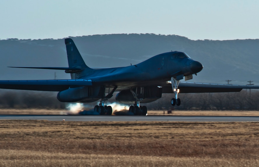 The first newly upgraded operational B1-B Lancer lands Jan. 21, 2014, at Dyess Air Force Base, Texas. The B-1B Lancer was recently upgraded with a new Integrated Battle Station. The new system includes a combination of three different upgrades. One major upgrade incorporates a modern datalink communication network that allows real-time communication with other aircraft, ground stations, and allied forces. The data link also enhances crew awareness of the battle space, and allows for quicker targeting. (U.S. Air Force photo by Staff Sgt. Richard Ebensberger/Released)
