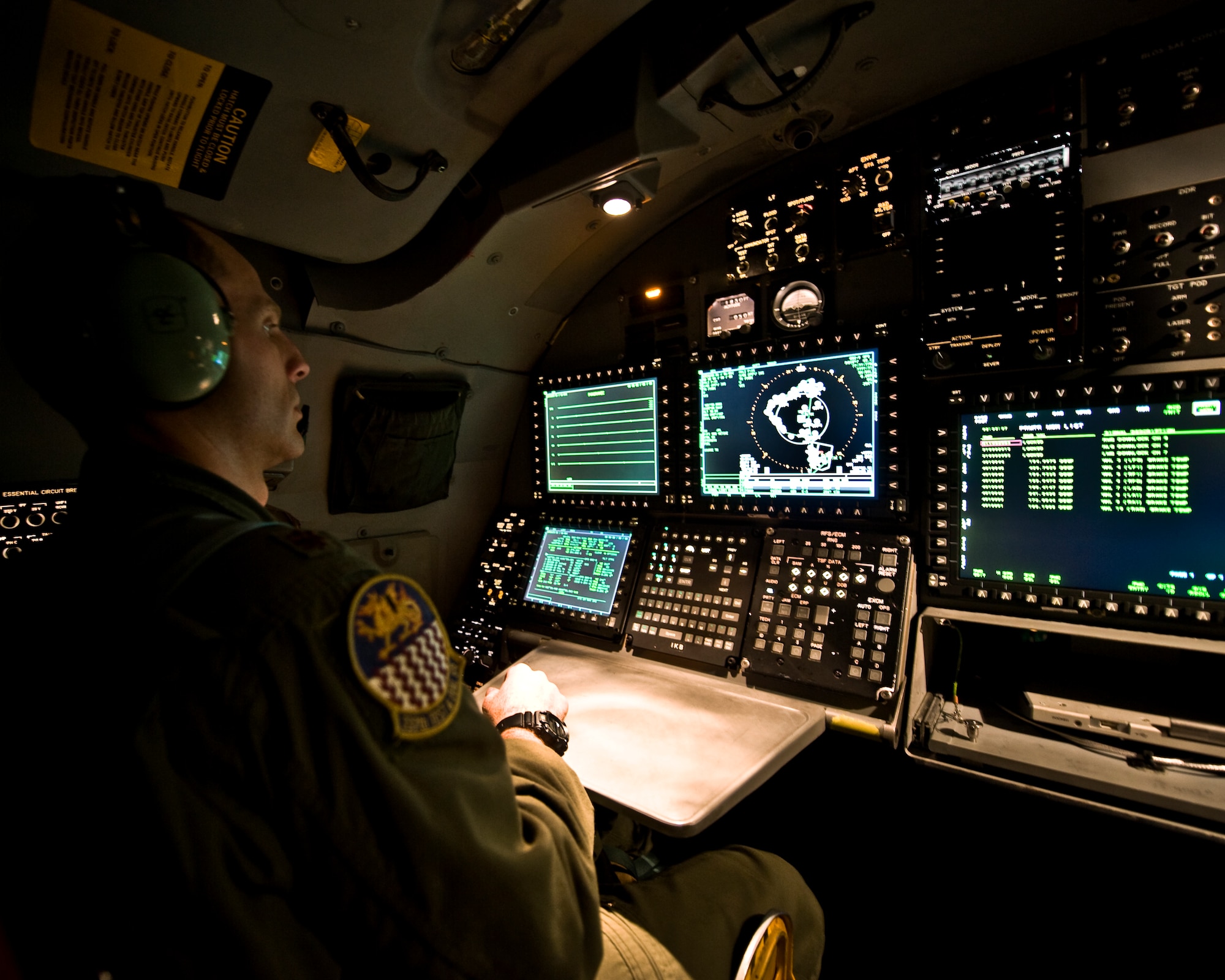 U.S. Air Force Maj. Shane Garner, 337th Test and Evaluation Squadron, completes a flight in the first newly upgraded operational B1-B Lancer Jan. 21, 2014, at Dyess Air Force Base, Texas. The B-1B Lancer was recently upgraded with a new Integrated Battle Station. The IBS is a combination of three different upgrades, which include a Fully Integrated Data Link, a Vertical Situation Display upgrade, and a Central Integrated System upgrade. The CITS upgrade adds a new color display in the aft cockpit and replaces an obsolete computer that continuously monitors the aircraft's performance. (U.S. Air Force photo by Staff Sgt. Richard Ebensberger/Released)