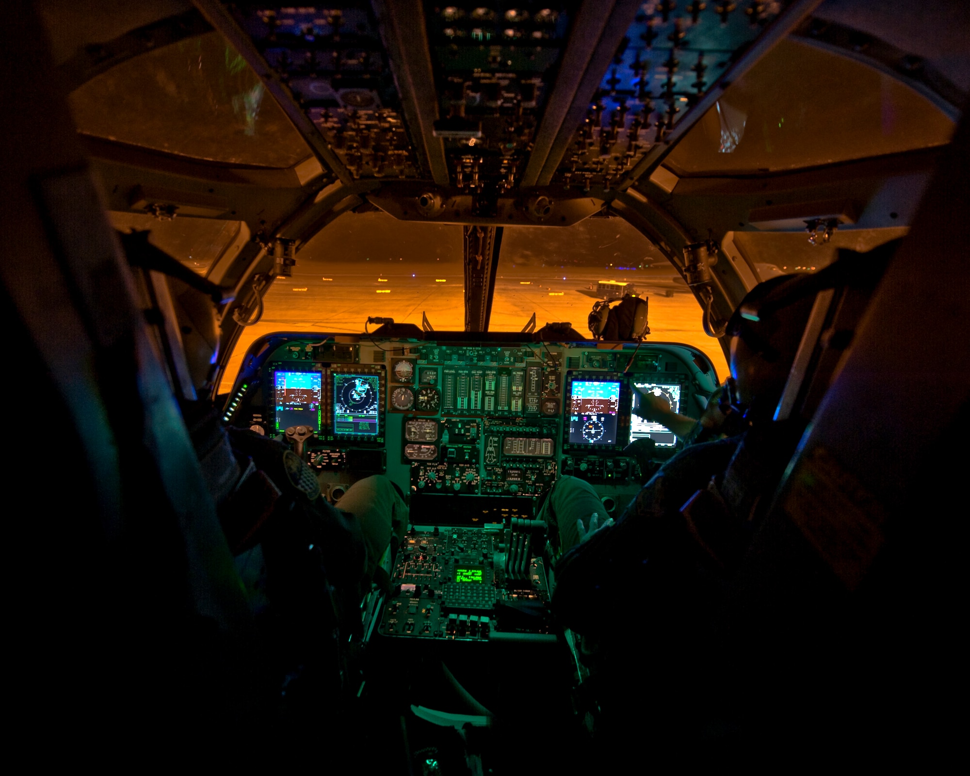 U.S. Air Force Maj. James Silva, left, and Lt. Col. Steven Myers, both B-1B Lancer pilots, complete a flight in the first newly upgraded operational B1-B Lancer Jan. 21, 2014, at Dyess Air Force Base, Texas. The B-1B Lancer was recently upgraded with an Integrated Battle Station. The IBS is a combination of three different upgrades, which includes a Fully Integrated Data Link, a Vertical Situation Display upgrade, and a Central Integrated System upgrade. The VSDU upgrades the B-1's forward cockpit by replacing two unsupportable, monochrome pilot and co-pilot displays with four multifunctional color displays, giving pilots more situational awareness data in a user-friendly format. (U.S. Air Force photo by Staff Sgt. Richard Ebensberger/Released)