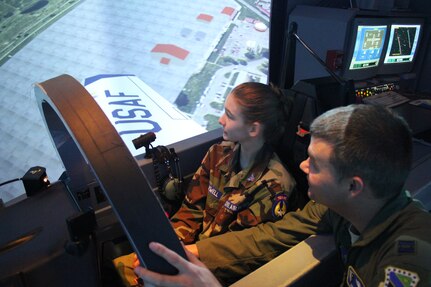 Captain Jared Wall (right), 559th Flying Training Squadron T-6 simulator instructor and Civil Air Patrol Cadet Savanna Maxwell fly over Joint Base San Antonio-Randolph Dec. 11.  (U.S. Air Force photo by Lt. Col. Andreas K. Wesemann) (Released