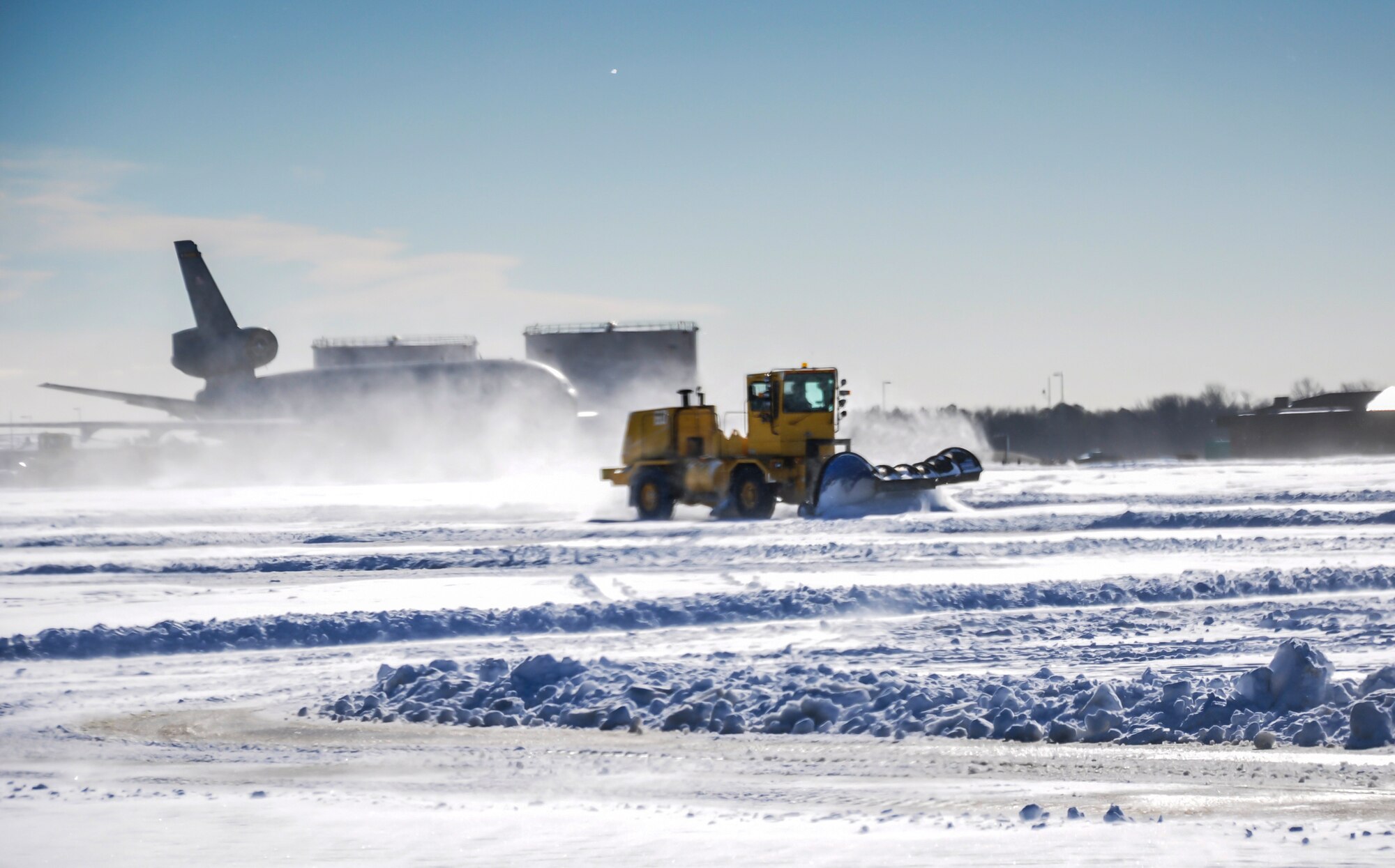 Members of the 87th Civil Engineer Squadron heavy equipment shop were out and about clearing tons of snow from the McGuire Field Jan. 22, 2014, on Joint Base McGuire-Dix-Lakehurst.  The storm dumped over 12 inches of snow in the area and forced the base into limited operations.  (U.S. Air Force photo by Wayne Russell)
