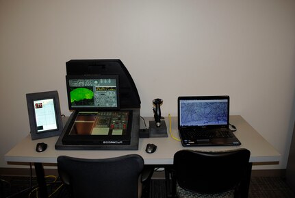 Example of a System Integration Lab (SIL) used by undergraduate aviation program students to familiarize themselves with preflight and operations before their first flight at the 451st Flying Training Squadron, Naval Air Station, Pensacola, Fla.  (U.S. Air Force photo by Rebekah Clark) 