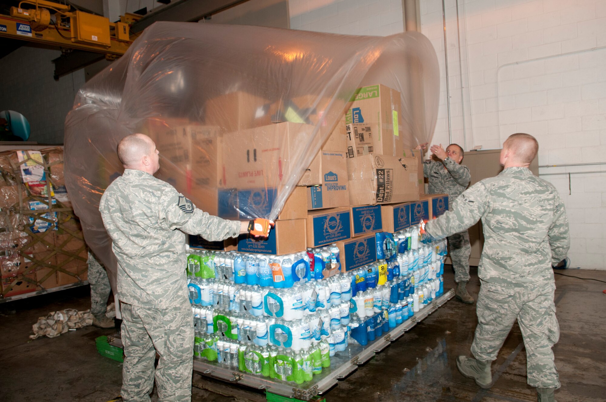 Airmen from the 167th Airlift Wing helped transport more than 60,000 pounds of donated supplies to Charleston, W.Va. for the 300,000 people left without drinking water in southern West Virginia. (Air National Guard photo by 2nd Lt. Stacy Gault)