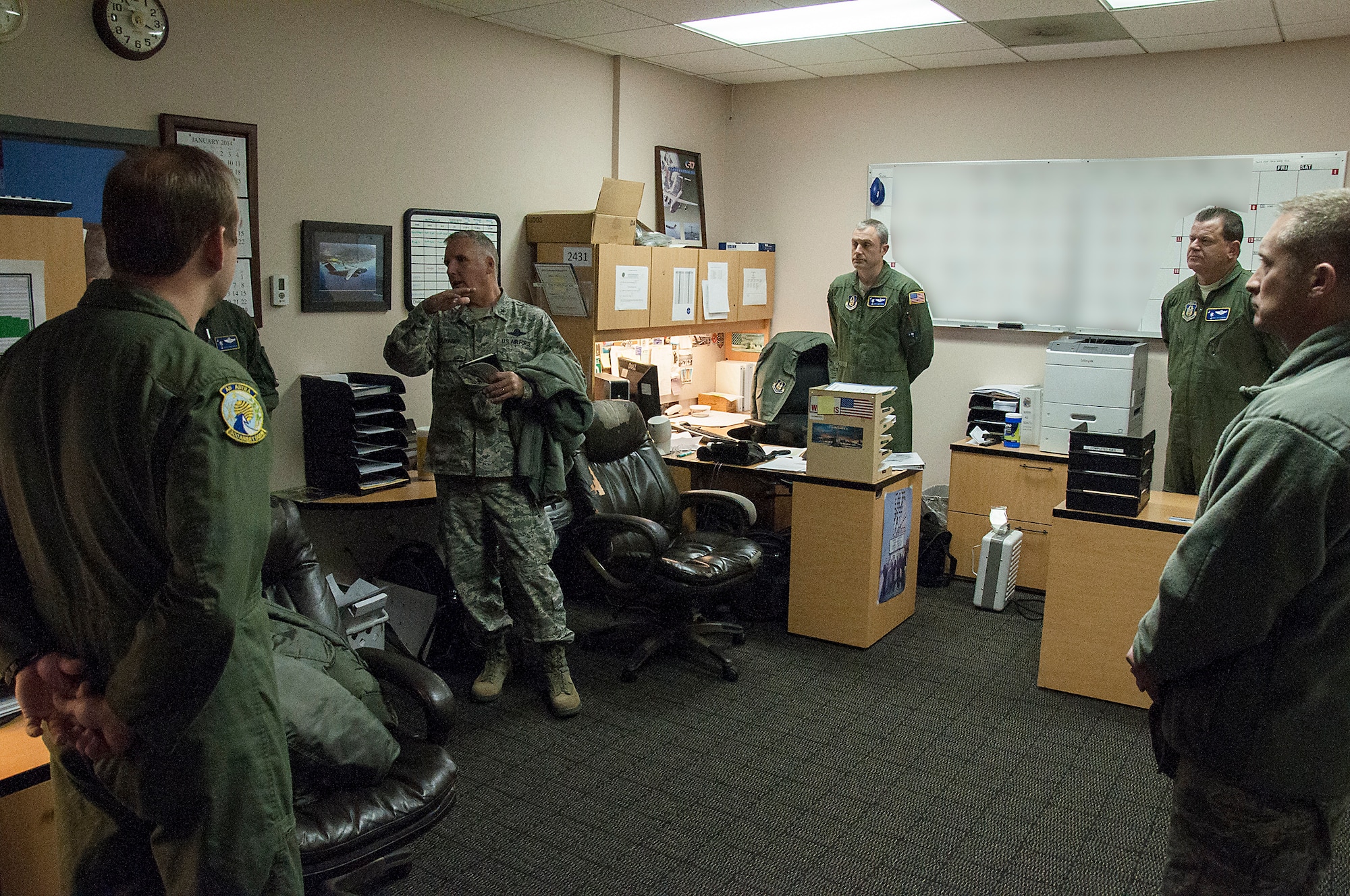 Brig. Gen. John C. Flournoy, Jr., 4th Air Force commander visited the 315th Airlift Wing at Joint Base Charleston Jan. 24 as part of an effort to get out and see the wing’s under his command. Here he talks with loadmasters at the 300th Airlift Squadron. (U.S. Air Force Reserve photo by Michael Dukes)