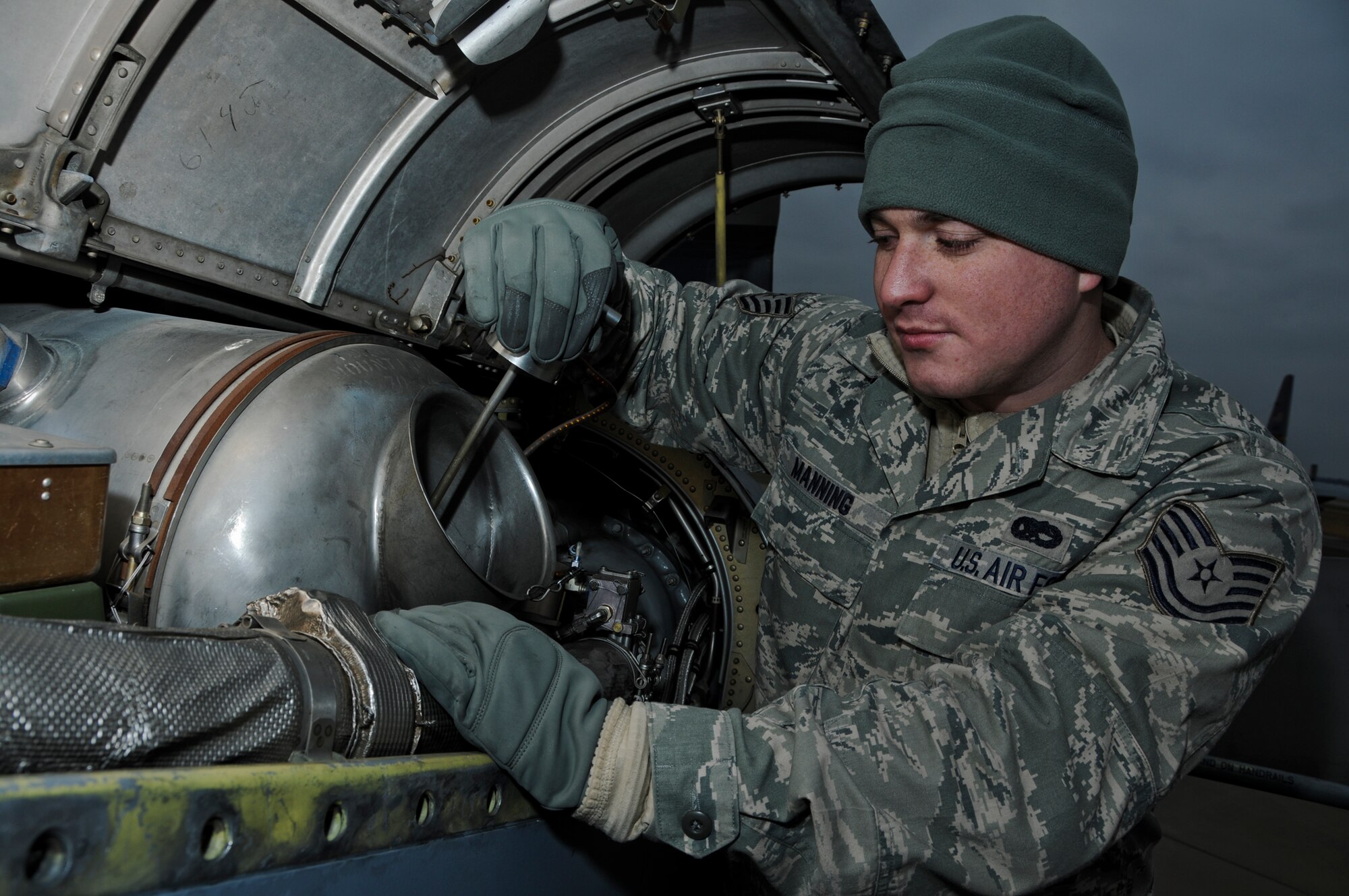 Tech. Sgt. Dan Manning, 911th Aircraft Maintenance Squadron crew chief, checks the oil level of a C-130 Hercules engine during a basic post-flight inspection, Jan. 12, 2014 at the Pittsburgh International Airport Air Reserve Station.  A check of the C-130’s fluids and functions is conducted before and after the completion of each flight to certify that the aircraft remains compliant with Air Force maintenance standards. Each of the C-130’s four engines is capable of holding up to 12 quarts of oil, but the maintained standard is 10 quarts of 899 synthetic turbine engine oil. (U.S. Air Force photo by Senior Airman Joshua J. Seybert