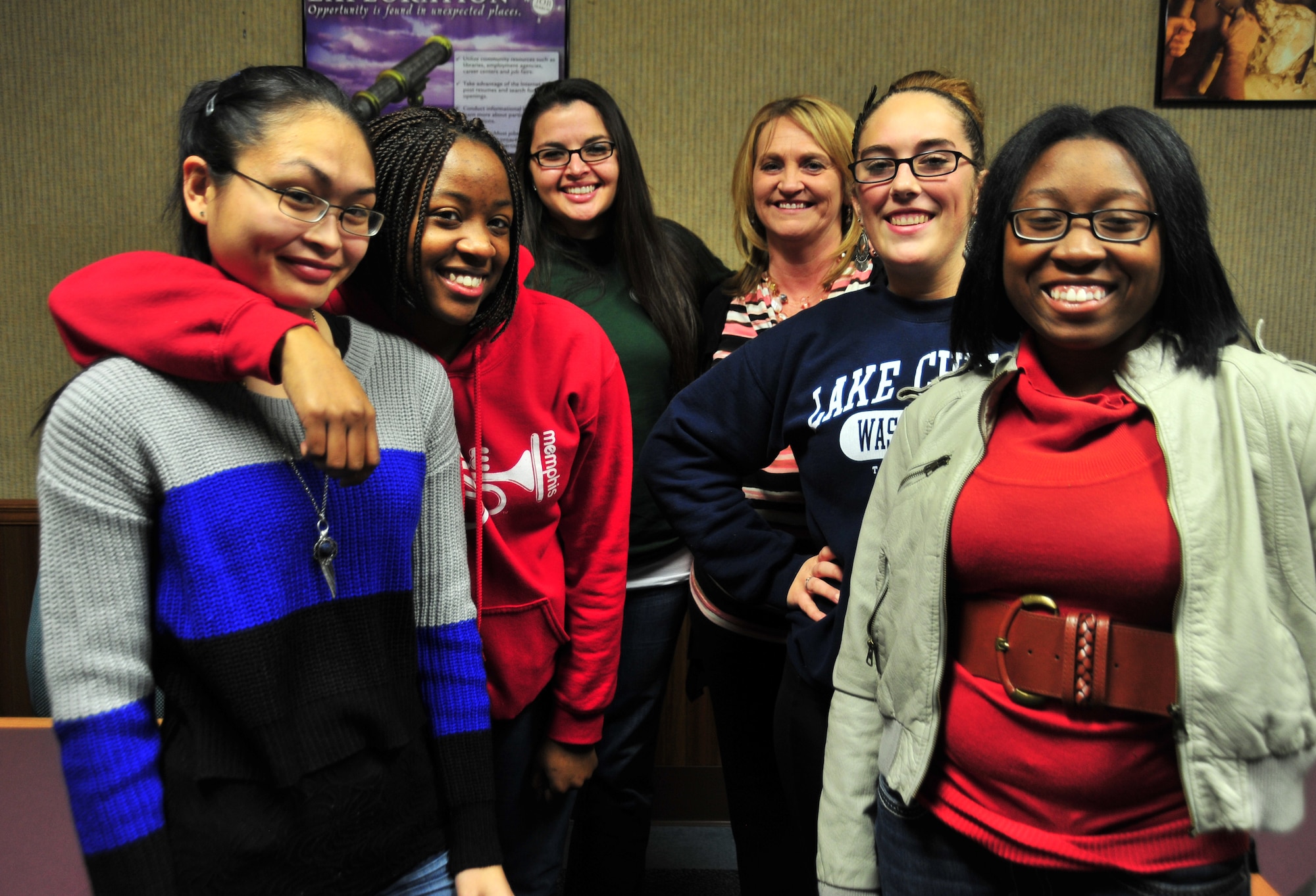 Members of the Female Dorm Resident Association pose for a group photo together Jan. 23 at the Airmen and Family Readiness Center. (U.S. Air Force photo by Airman 1st Class Sergio Gamboa)