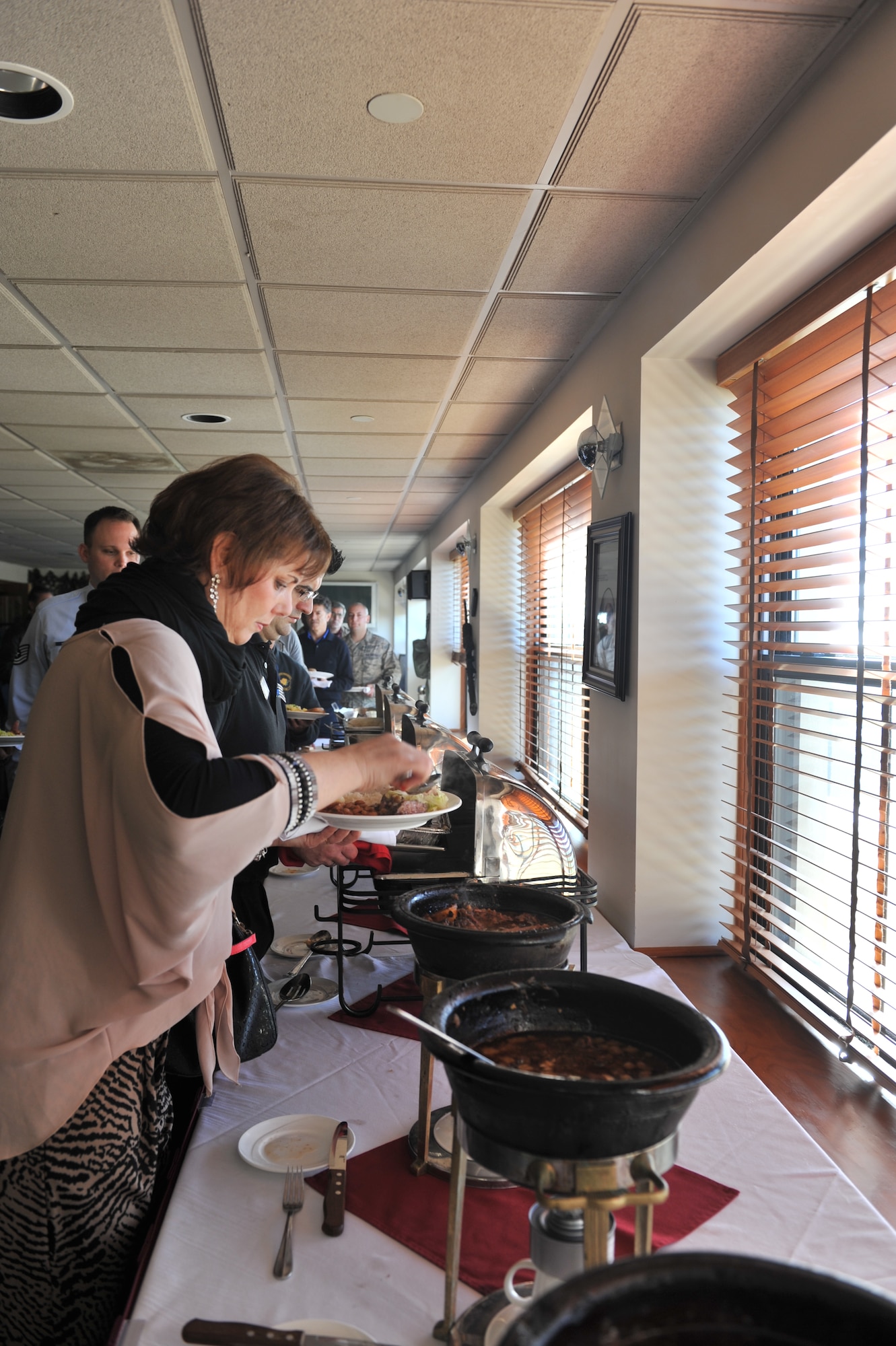 The 65th Air Base Wing honored Portuguese employees with a luncheon here Jan. 24. The luncheon was held at the Top of the Rock Club and included a traditional Azorean Alcatra meal. Col. Chris Bargery, 65th Air Base Wing commander, recently designated each January as Portuguese Employee Appreciation Month to recognize the nearly 800 Portuguese employees who work with U.S. Air Force service members stationed at Lajes Field, Azores. (U.S. Air Force photo by Staff Sgt. Angelique N. Smythe)