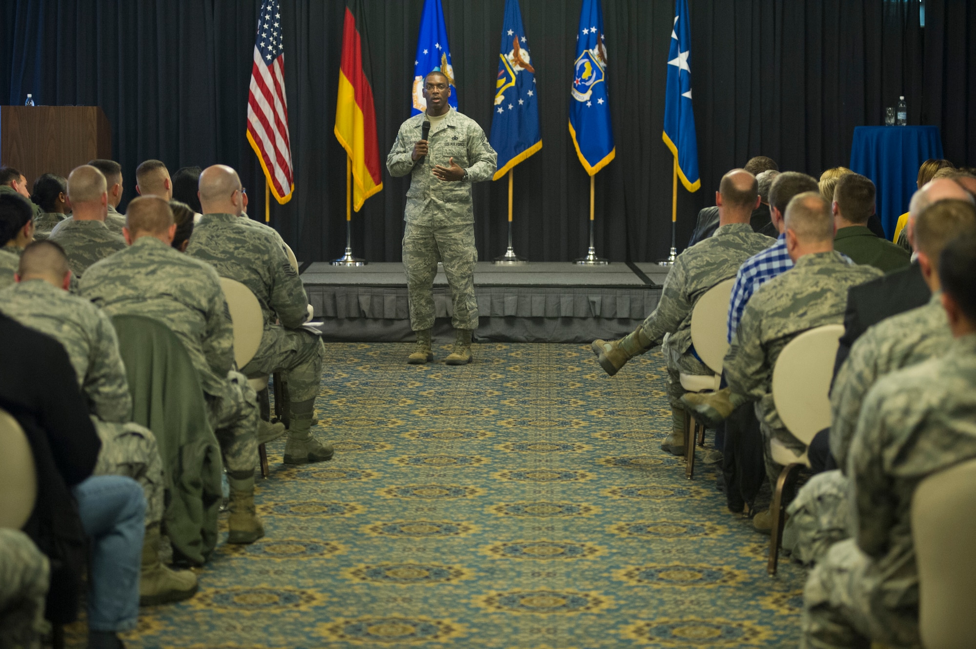 Chief Master Sgt. James Davis, U.S. Air Forces in Europe and Air Forces Africa command chief, addresses members of his command staff during an all call at Ramstein Air Base, Germany, Jan. 24, 2014. Topics for the commander’s call included the importance of forward basing, maintaining professional environments, and personal responsibility. (U.S. Air Force photo/Tech. Sgt. Benjamin Wilson)