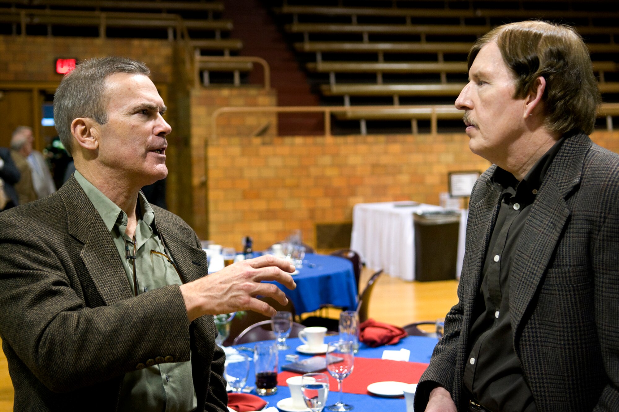 Retired Lt. Col. (Dr.) Gary Lockard, right, talks with retired Col. Tim Cahoon, a former 434th Air Refueling Wing commander, during a Grissom Community Council meeting in Wabash, Ind., Jan. 17, 2014. Lockard was named a new GCC regional director for Peru, Ind. (U.S. Air Force photo/Tech. Sgt. Mark R. W. Orders-Woempner)
