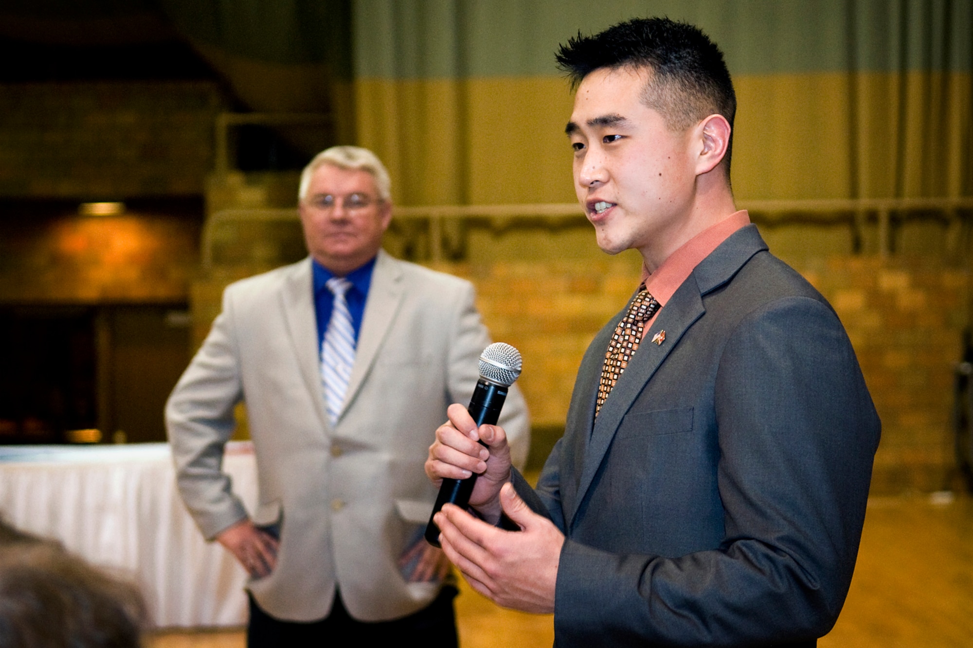 U.S. Marine Capt. Timothy Chun, Detachment One, Communication Company, Combat Logistics Regiment 45, 4th Marine Logistics Group inspector instructor, talks about what his unit does at Grissom Air Reserve Base, Ind., as Col. Don Buckley, 434th Air Refueling Wing commander, looks on during a Grissom Community Council meeting in Wabash, Ind., Jan. 17, 2014. Grissom is home to the 434th ARW as well as Detachment One and three Army Reserve units. (U.S. Air Force photo/Tech. Sgt. Mark R. W. Orders-Woempner)
