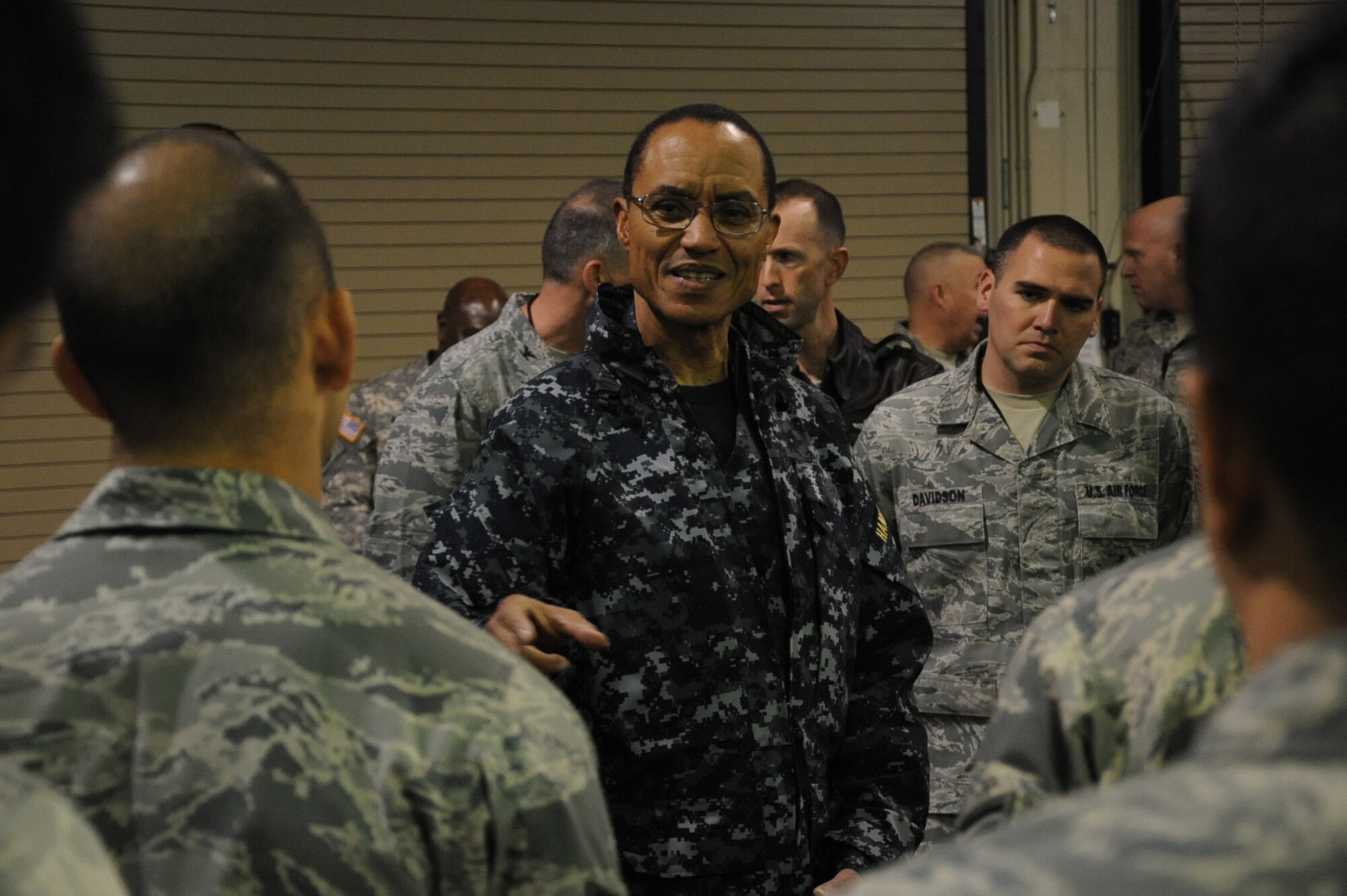Adm. Cecil D. Haney, U.S. Strategic Command commander, addresses an Airman's question during his visit on Barksdale Air Force Base, La., Jan. 23, 2014. Haney's travel to Barksdale was the latest stop in a series of ongoing visits to bases with nuclear deterrent forces. Admiral Haney observed training and operations and met with personnel, discussing the importance of the triad and thanking Airmen for their service and contributions to our nation's nuclear deterrence mission.  (U.S. Air Force photo/Staff Sgt. Sean Martin)

