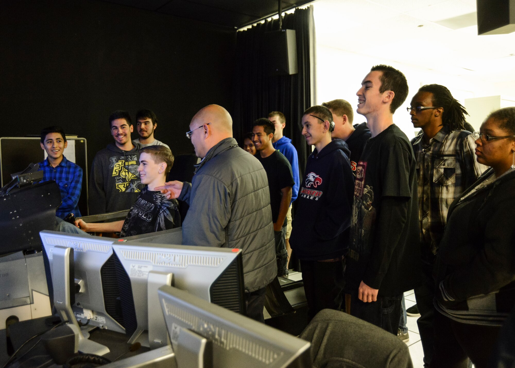 Students from Antelope Valley, Lancaster and Desert High Schools participated in a Science, Technology, Engineering and Math-focused tour of Edwards AFB, Jan. 22. Their stops included the Air Force Test Pilot School, the 412th Electronic Warfare Group and NASA. While at 412th EWG, each student was given two minutes to fly the F-16 simulator at the Integration Facility for Avionics Systems Test. (U.S. Air Force photo by Rebecca Amber)
