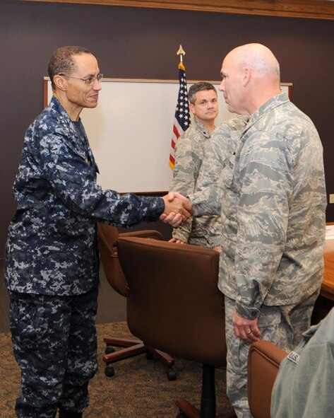 Adm. Cecil D. Haney, U.S. Strategic Command commander, greets Col. Patrick Matthews, 2nd Mission Support Group commander, at the Integrated Operations Center on Barksdale Air Force Base, La., Jan. 23, 2014. Haney's travel to Barksdale was the latest stop in a series of ongoing visits to bases with nuclear deterrent forces. Admiral Haney observed training and operations and met with personnel, discussing the importance of the triad and thanking Airmen for their service and contributions to our nation's nuclear deterrence mission.  (U.S. Air Force photo/Senior Airman Joseph A. Pagan Jr.)
