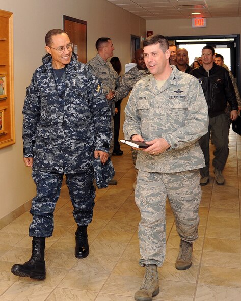 Adm. Cecil D. Haney, U.S. Strategic Command commander, speaks with Col. Andrew Gebara, 2nd Bomb Wing commander, at the Integrated Operations Center on Barksdale Air Force Base, La., Jan. 23, 2014. Haney's travel to Barksdale was the latest stop in a series of ongoing visits to bases with nuclear deterrent forces. Admiral Haney observed training and operations and met with personnel, discussing the importance of the triad and thanking Airmen for their service and contributions to our nation's nuclear deterrence mission.  (U.S. Air Force photo/Senior Airman Joseph A. Pagan Jr.)
