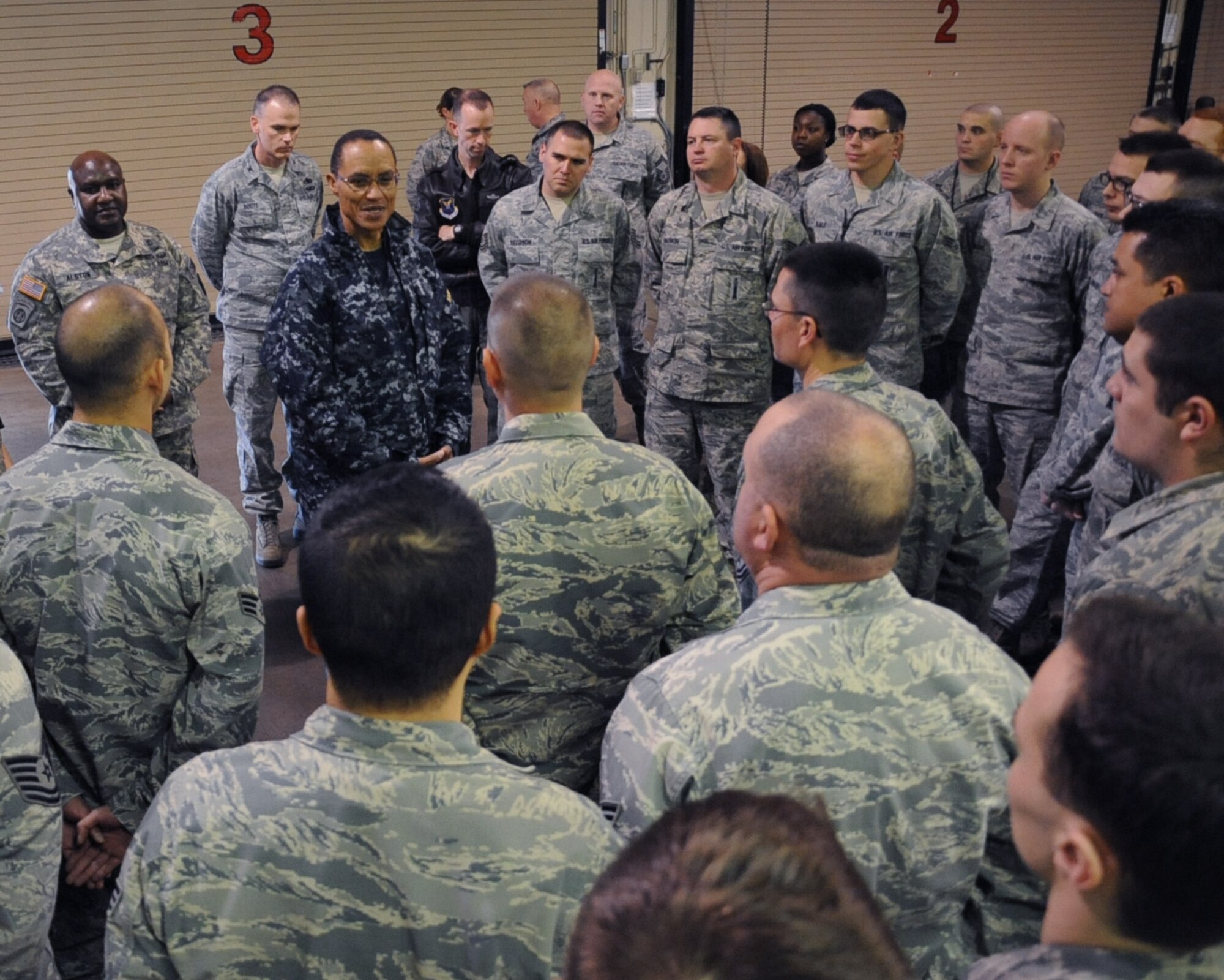 Adm. Cecil D. Haney, U.S. Strategic Command commander, spoke with Airmen from the 2nd Maintenance Group during a recent visit on Barksdale Air Force Base, La., Jan. 23, 2014. Haney's travel to Barksdale was the latest stop in a series of ongoing visits to bases with nuclear deterrent forces. Admiral Haney observed training and operations and met with personnel, discussing the importance of the triad and thanking Airmen for their service and contributions to our nation's nuclear deterrence mission.  (U.S. Air Force photo/Staff Sgt. Sean Martin)

