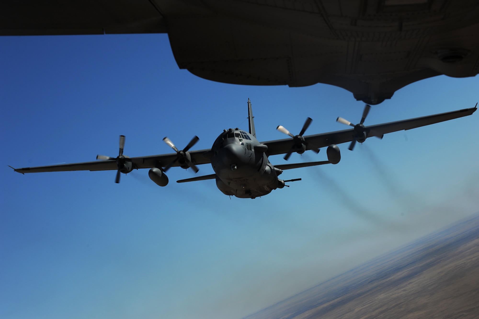 Eight AC-130H Spectre gunships taxi into position on the flightline prior to the final AC-130H mission conducted at Cannon Air Force Base, N.M., Jan. 16. The C-130 began its operational service with the Air Force in 1956 and AC-130 development began in the early 1960s.(U.S. Air Force photo/Senior Airman Xavier Lockley)