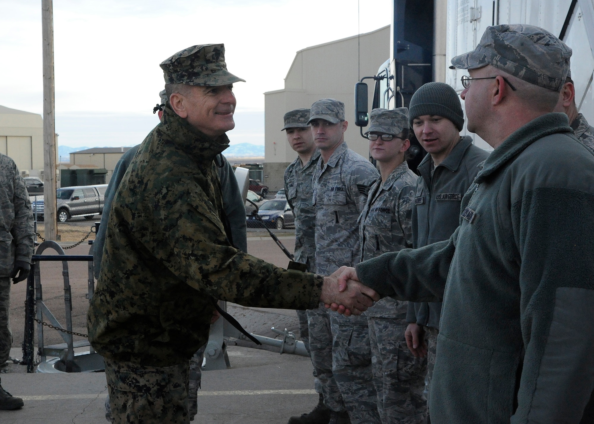 Sgt. Maj. Bryan Battaglia, Senior Enlisted Advisor to the Chairman of the Joint Chiefs of Staff, greets Airmen at the T-9 Maintenance Trainer at Malmstrom Air Force Base on Jan. 17. Battaglia visited the trainer to better understand daily operations of maintenance personnel at a launch facility and hear their opinion of what could be done to help them complete their mission in the field. (U.S. Air Force photo/Airman 1st Class Collin Schmidt)

