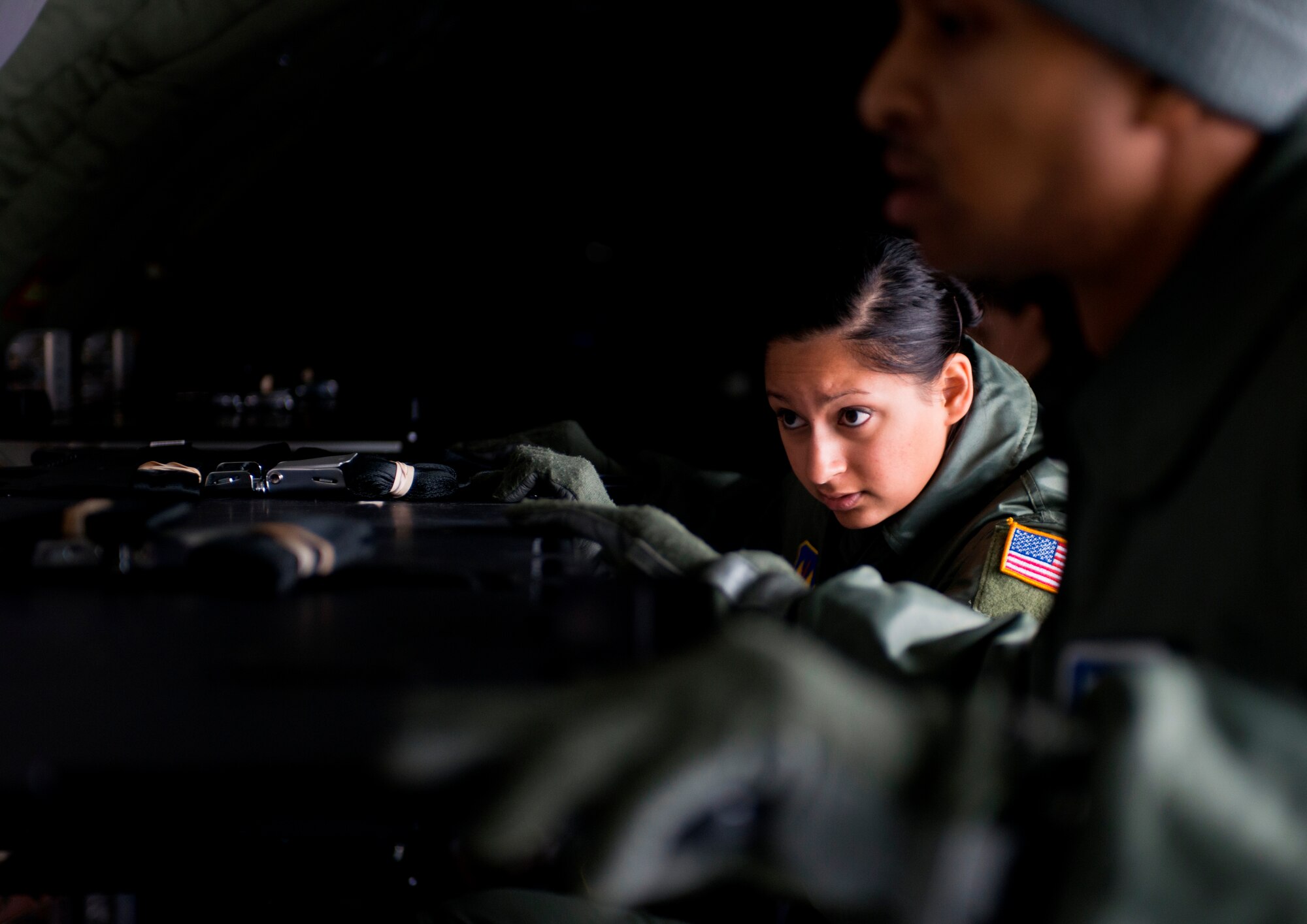 Staff Sgt. Mariana Hopper, 86th Aeromedical Evacuation Squadron technician, builds a rack in the cargo bay during training Jan. 23, 2014, Ramstein Air Base, Germany. The training provided an opportunity for the AES Airmen to become more comfortable with assembling their medical equipment in various airframes. (U.S. Air force photo/Senior Airman Jonathan Stefanko)