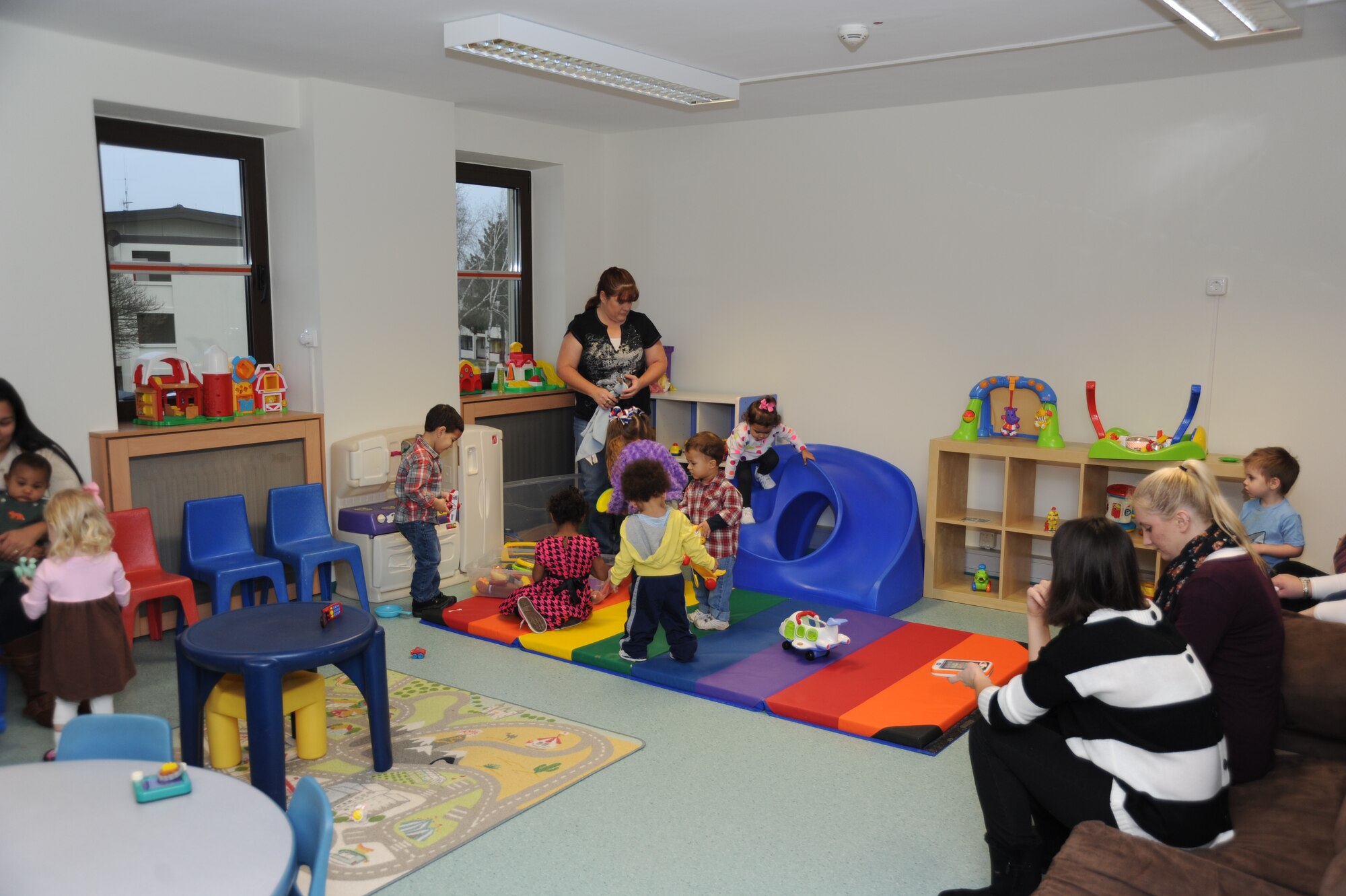 Children of Spangdahlem Airmen enjoy the opening of the new Family Advocacy Play Group play room at Spangdahlem Air Base, Germany, Jan. 21, 2014. The play room is open every Tuesday and Thursday from 10 a.m. to 12 p.m. for infants through school-age children. (U.S. Air Force photo by Airman 1st Class Dylan Nuckolls/Released)
