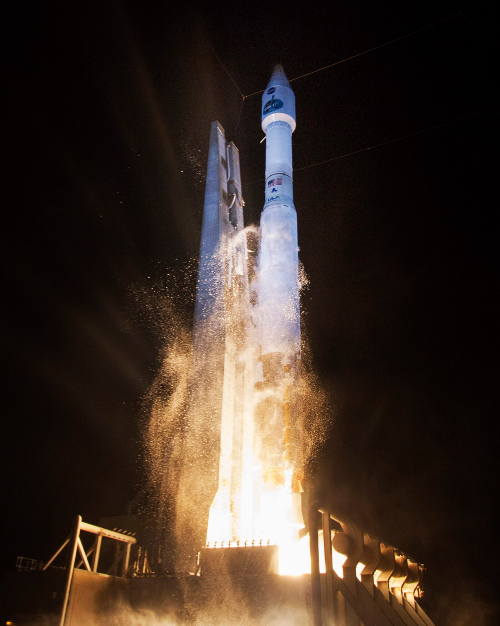 Cape Canaveral Air Force Station, Fla. (Jan. 23, 2014) – A United Launch Alliance (ULA) Atlas V rocket successfully launched NASA’s Tracking and Data Relay Satellite (TDRS-L) payload at 9:33 p.m. EST today from Space Launch Complex-41. This was the first of 15 ULA launches scheduled for 2014 and the 78th ULA launch for ULA in just over seven years. NASA established the TDRS project in 1973, with the first launch in 1983, to provide around-the-clock and around-the-Earth communications for the network that routes voice calls, telemetry streams and television signals from the International Space Station, as well as telemetry and science data from the Hubble Space Telescope and other orbiting spacecraft. (Photo by Ben Cooper, United Launch Alliance)
