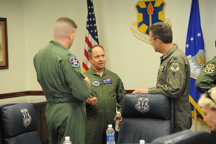 Air Force Col. Ken Frollini (center), Air Education and Training Command inspector general, briefs Air Force Col. James Gifford (left), 12th Flying Training Wing vice commander, and Air Force Col. Gerald Goodfellow, 12th FTW commander, Jan. 15 at Joint Base San Antonio-Randolph during the 12th FTW 2014 Headquarters AETC Combined Unit Inspection. (U.S. Air Force photo by Melissa Peterson)
