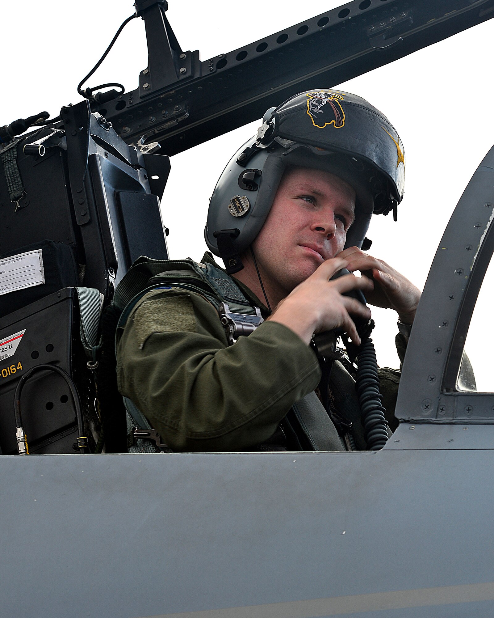 Capt. Everett Probasco, 493rd Fighter Squadron F-15C Eagle pilot puts his helmet and mask on prior to take-off during the Tactical Leadership Program at Albacete  Air Base, Spain Jan. 21, 2014. The 493rd FS from Royal Air Force Lakenheath, England is participating in the multi-national program, which develops key leadership and mission-planning skills needed for NATO operations. Jan. 21, 2014. (U.S. Air Force photo by Staff Sgt. Stephanie Mancha/Released)