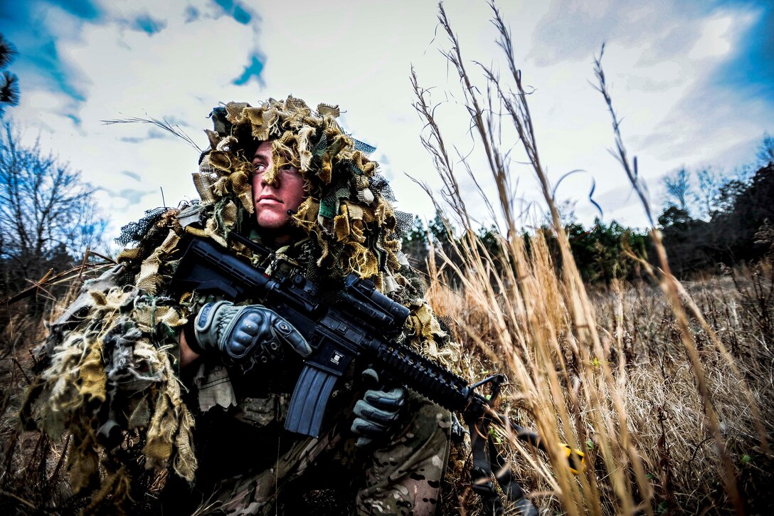 Air Force Staff Sgt. Samuel Weaver Waits In The Grass For Role Players 