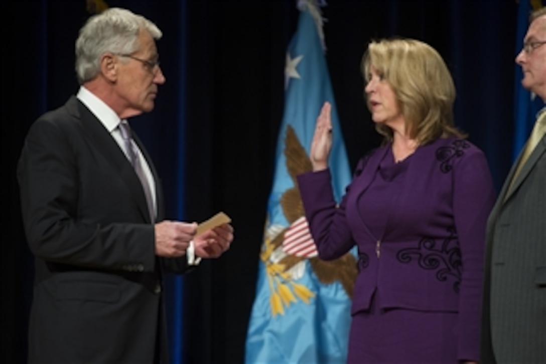 Defense Secretary Chuck Hagel swears in Air Force Secretary Deborah Lee James during a welcome ceremony at the Pentagon, Jan. 24, 2014. James was officially sworn in Dec. 20, 2013, and serves as the 23rd secretary.