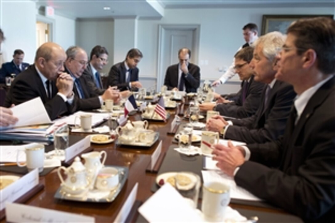 U.S. Defense Secretary Chuck Hagel meets with French Defense Minister Jean-Yves Le Drian at the Pentagon, Jan. 24, 2014. Both leaders discussed defense matters of mutual imnportance, then hosted a news conference with reporters.