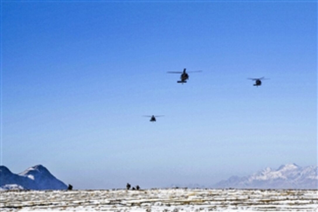U.S. Special Forces and Afghan soldiers arrive in UH-60 Black Hawk helicopters to conduct a clearing operation to disrupt insurgent movement in Jafare Sufla in the Shah Joy district in Afghanistan's Zabul province, Jan. 15, 2014. The U.S. soldiers are assigned to Combined Joint Special Operations Task Force Afghanistan.