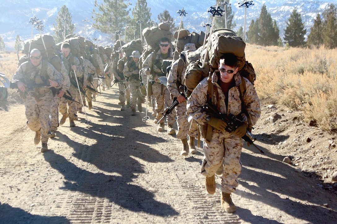 Capt. David Kucirka, the intelligence officer for 2nd Battalion, 2nd Marine Regiment, 2nd Marine Division, leads a group of Marines during a hike at the Marine Corps Mountain Warfare Training Center in Bridgeport, Calif. To gain an expeditionary mindset the Marines and Sailors of 2nd Battalion, 2nd Marines and Ragnarok Co., 2nd Marine Logistics Company, conducted a 10-day field exercise, which consisted of long range day and night foot movement through extremely rugged terrain with drastic elevation changes and tested the Marines’ endurance.